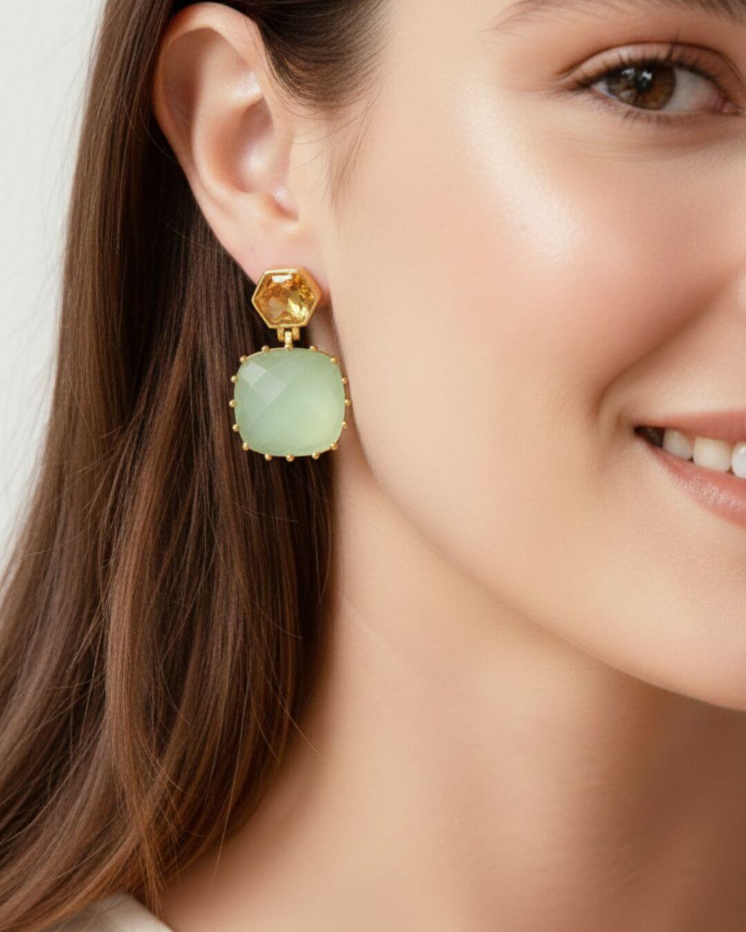 Blue earrings by Bombaybirds featuring intricate design, detailed craftsmanship, and a vibrant blue color.