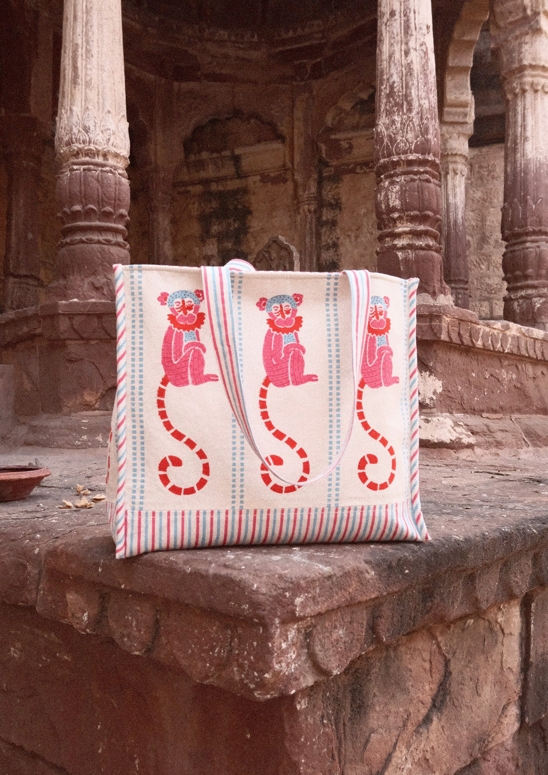 Funky monkey block print tote bag from The Raw India, casual reusable bag with vibrant monkey design and sturdy handles.