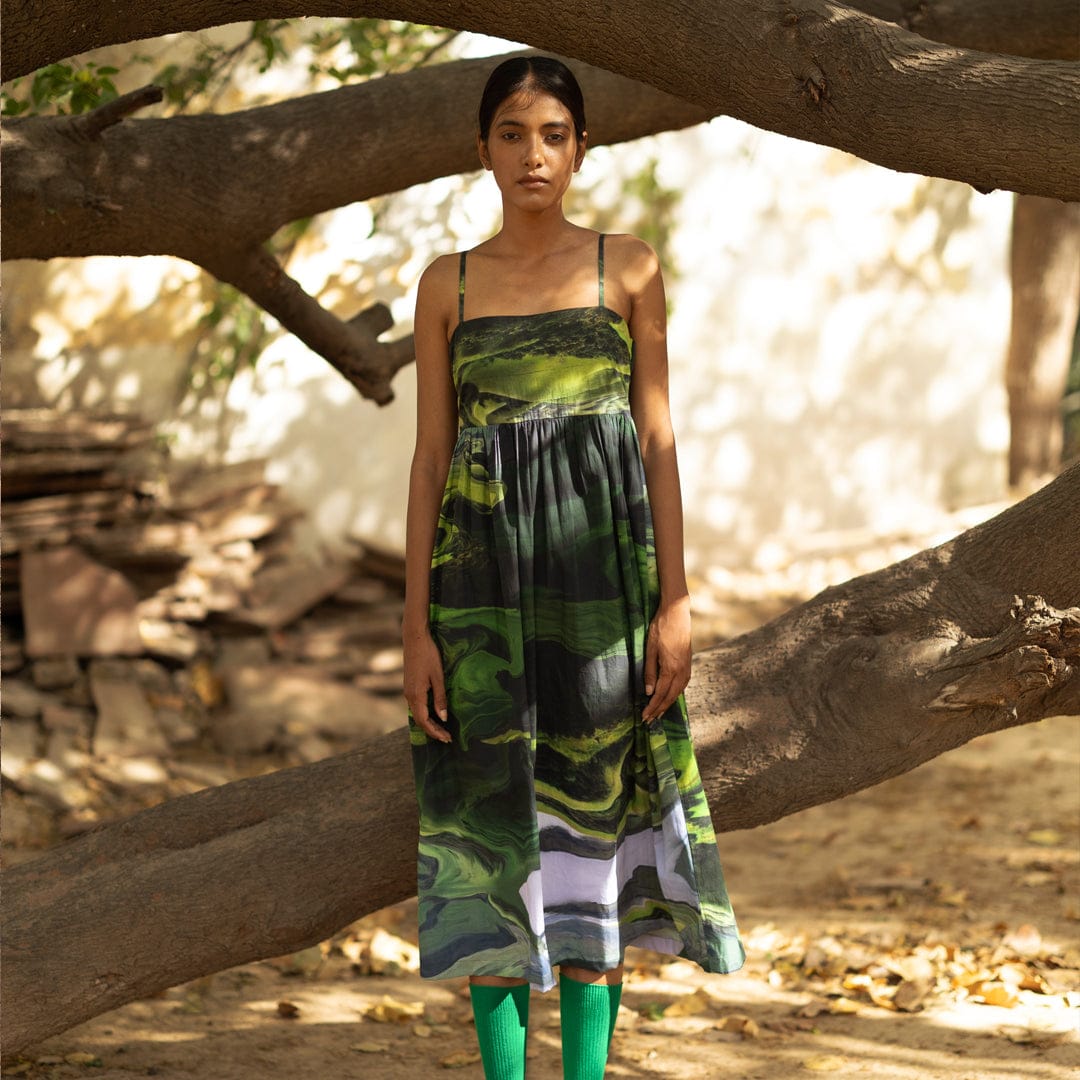 Doodlage Ella green dress with flowy fabric and short sleeves, stylish and comfortable for casual wear.