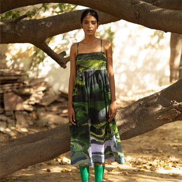 Doodlage Ella green dress with flowy fabric and short sleeves, stylish and comfortable for casual wear.