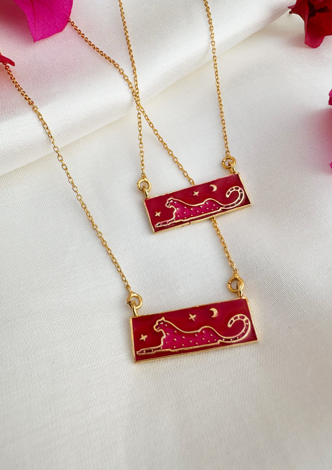 Pink leopard meenakari pendant from The Raw India jewelry featuring intricate enamel work and vibrant design.