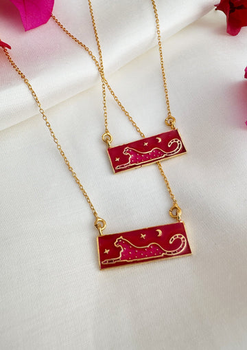 Pink leopard meenakari pendant from The Raw India jewelry featuring intricate enamel work and vibrant design.