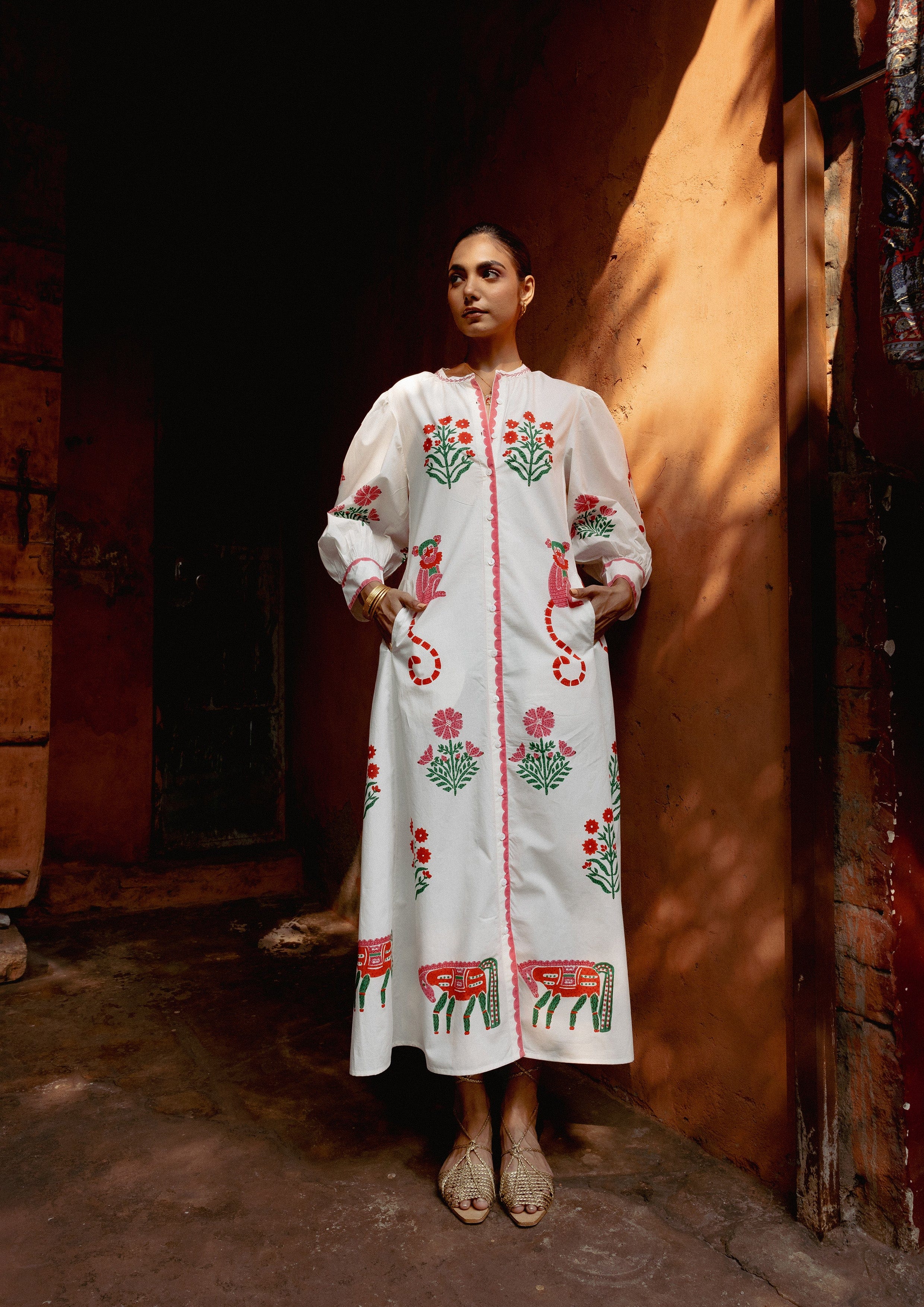 The Raw India Chaupad shirt dress in a vibrant mix print, featuring a relaxed fit and stylish collar design.