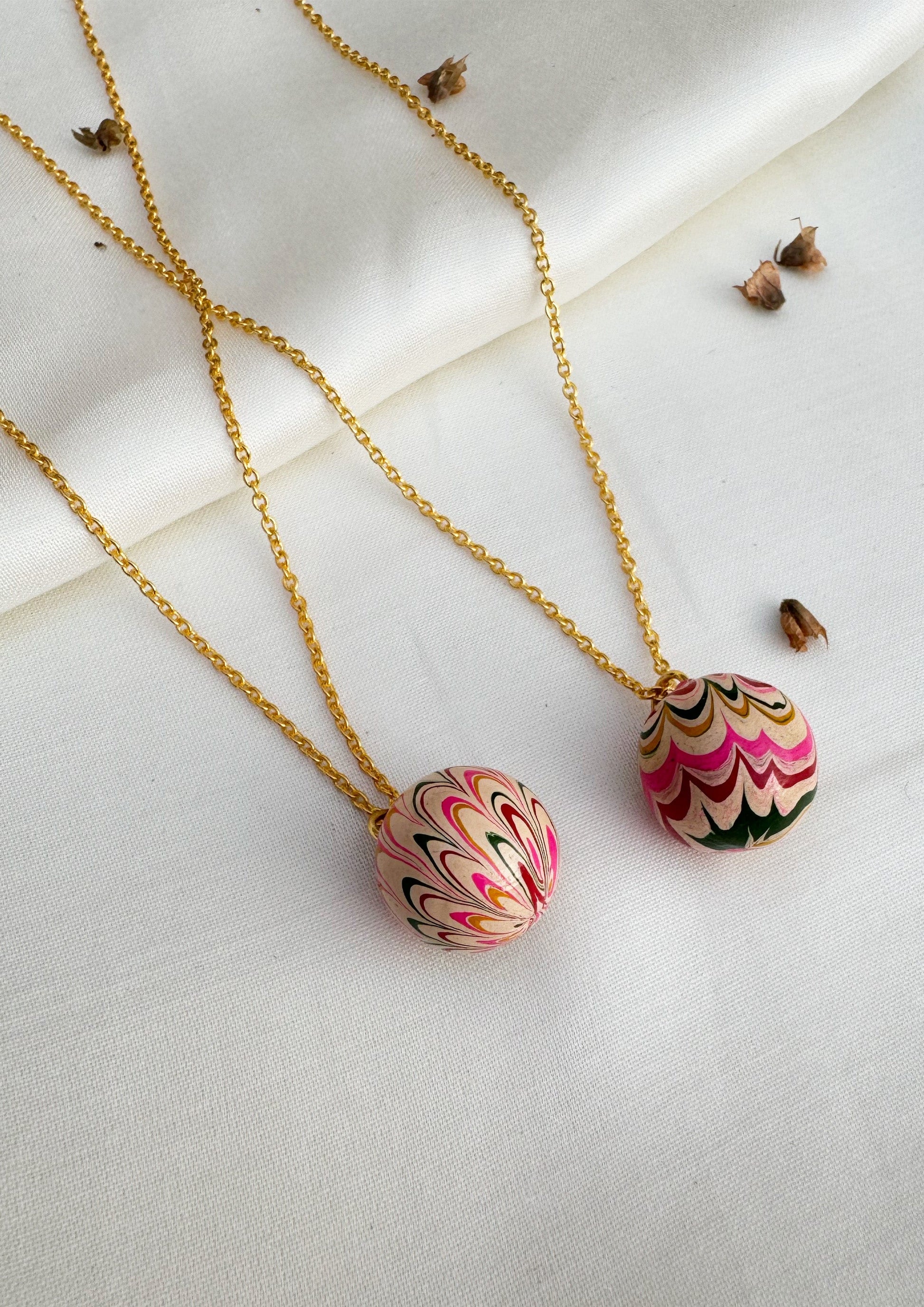 Gold Lac pendant from The Raw India jewelry collection, featuring intricate craftsmanship and traditional design.