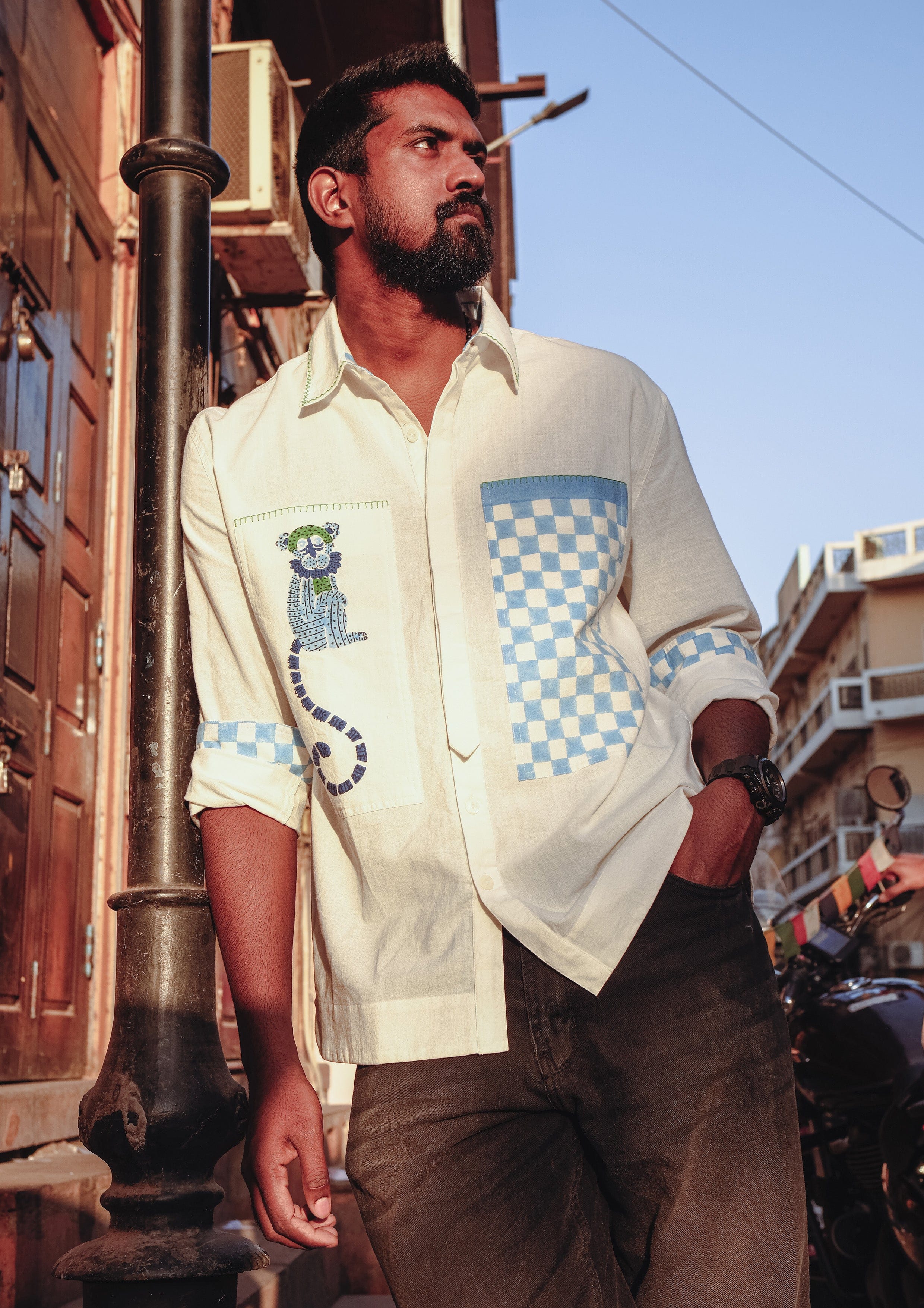 Sawai shacket jodhpur monkey block print shirt by The Raw India displayed on a hanger, featuring traditional textile patterns.