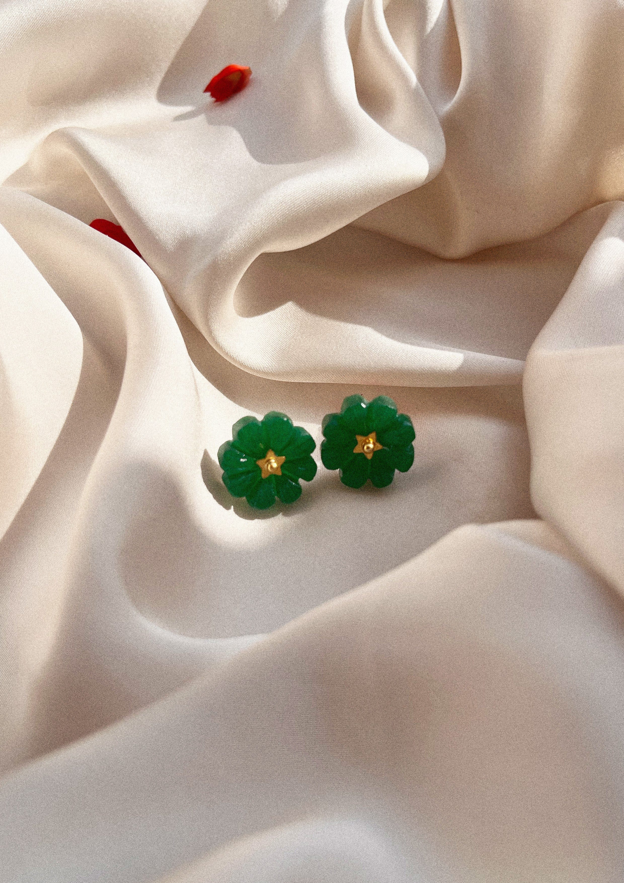 Green onyx flower studs jewelry featuring vibrant green gemstone floral design, crafted by The Raw India.