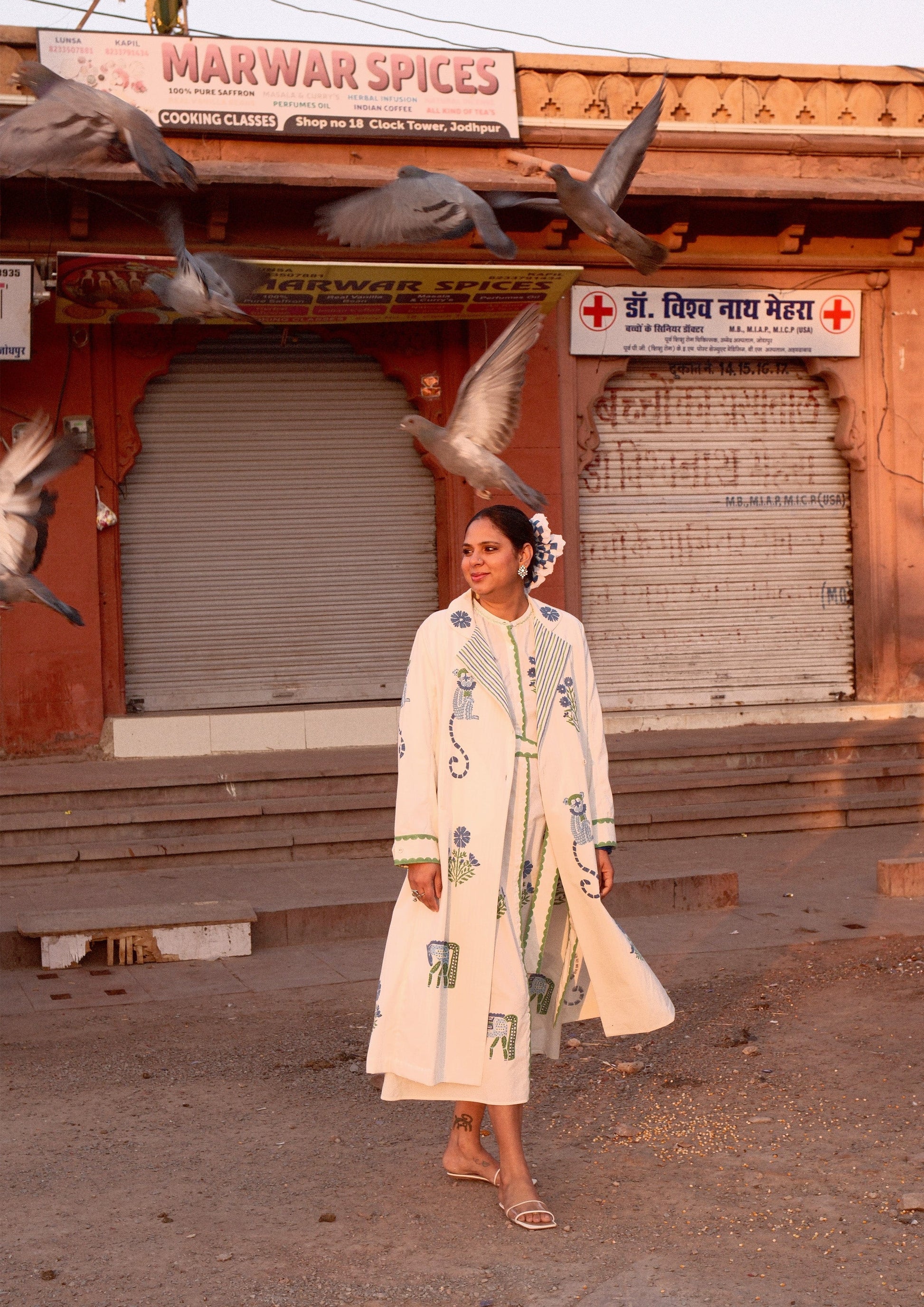 The Raw India Palace coat jodhpur mix print jacket featuring vibrant patterns and traditional Indian-inspired design.