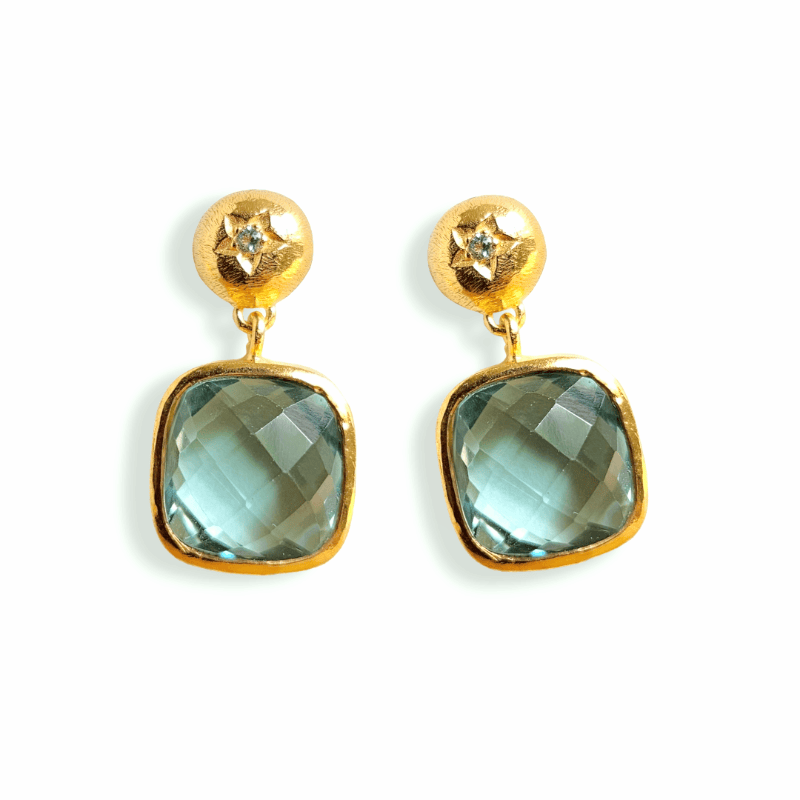 Bombaybirds Izare earrings featuring intricate metalwork and dangling design, shown close-up against a neutral background.