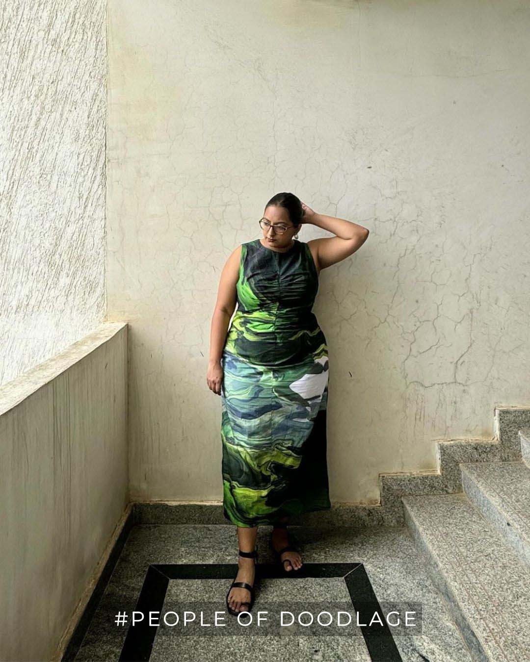 Doodlage Sarah printed dress with vibrant floral pattern, lightweight fabric, and flattering fit, perfect for casual or semi-formal wear.