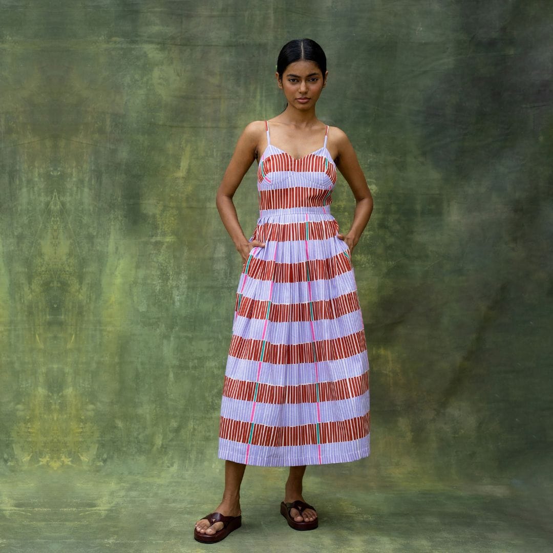Doodlage Mary striped dress, knee-length casual dress with colorful vertical stripes and short sleeves, on a hanger.