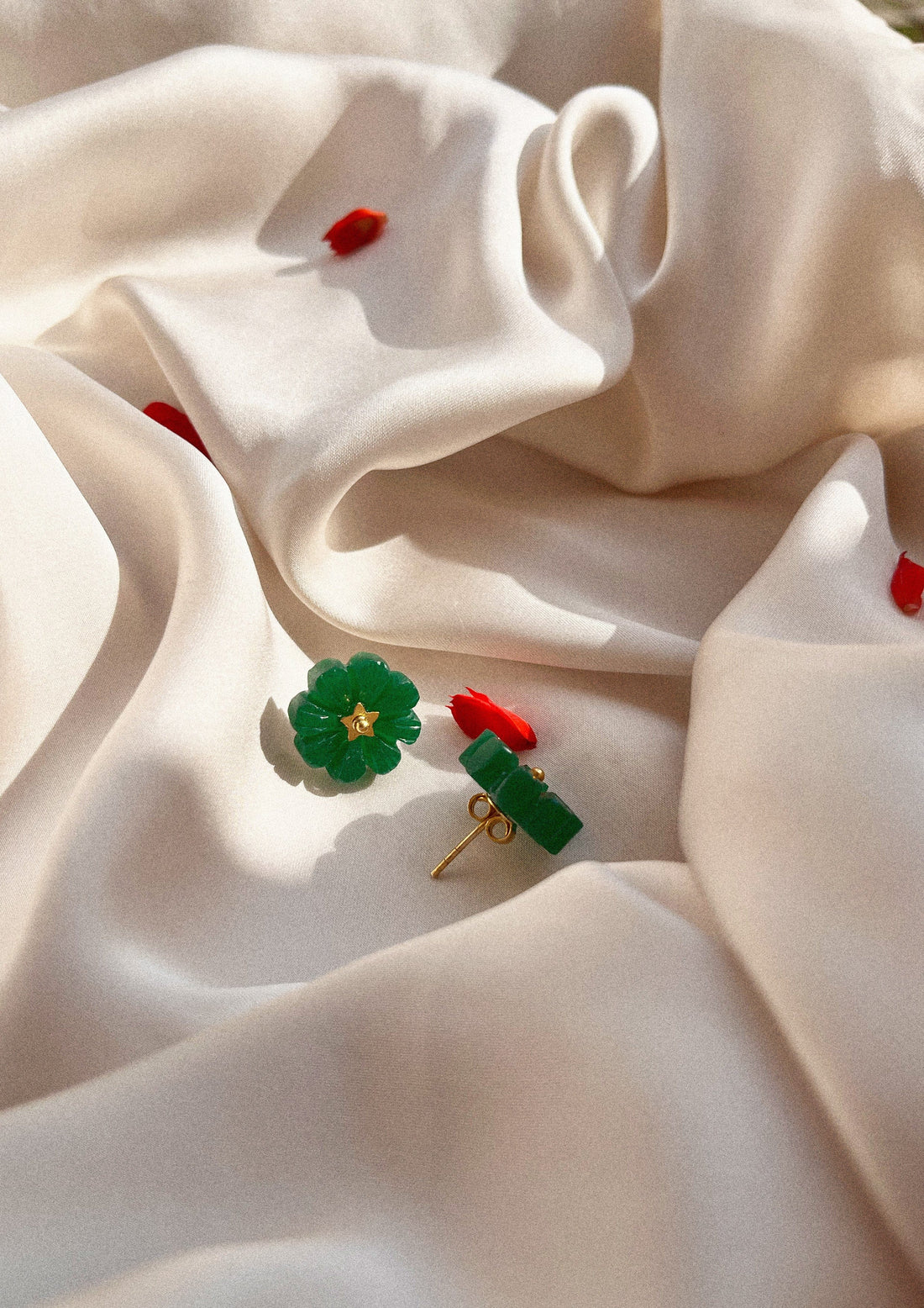 Green onyx flower studs jewelry featuring vibrant green gemstone floral design, crafted by The Raw India.