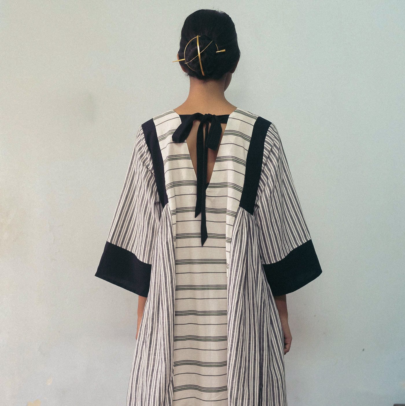 Deeta Shima dress featuring a stylish design, lightweight fabric, and elegant fit, perfect for casual or semi-formal occasions.