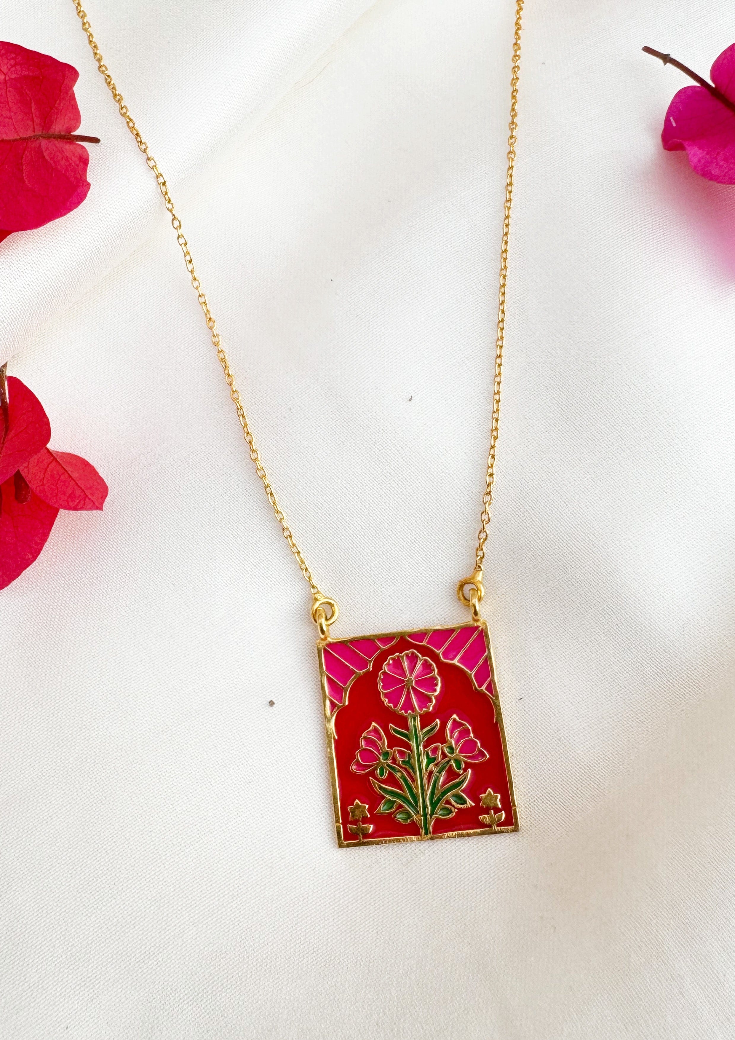 Pink buta meenakari pendant from The Raw India jewelry collection, featuring intricate traditional design and vibrant colors.