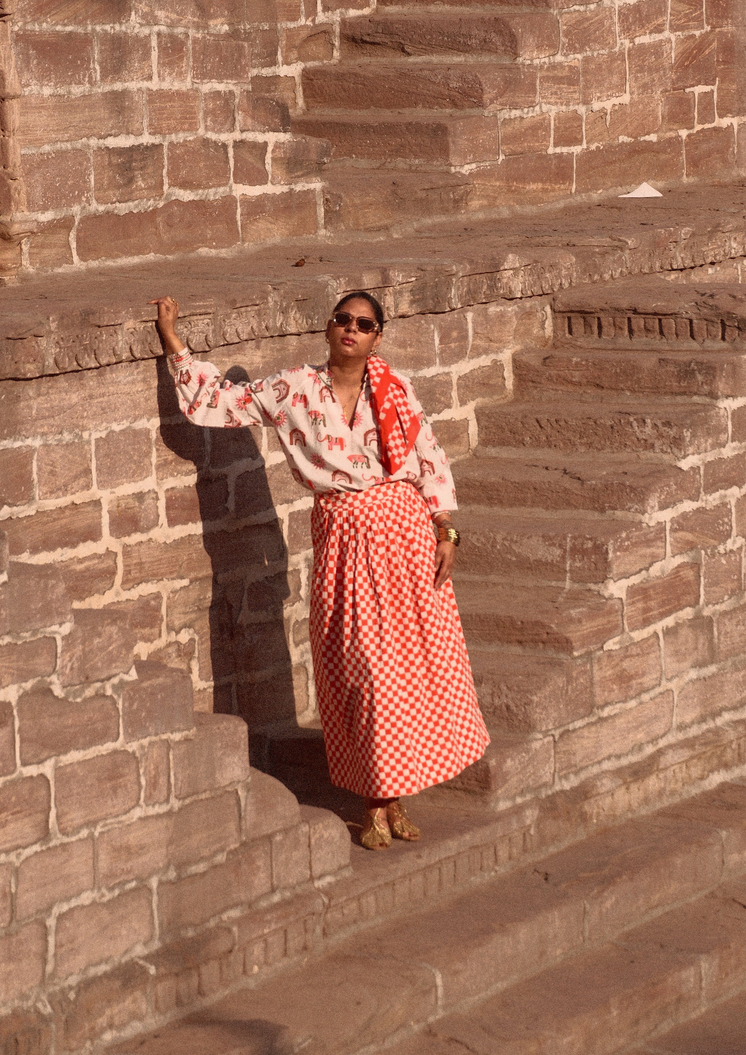 The Raw India Mahal blouse in Blossom Jaipur mix featuring intricate embroidery and vibrant fabric, styled as a traditional top.