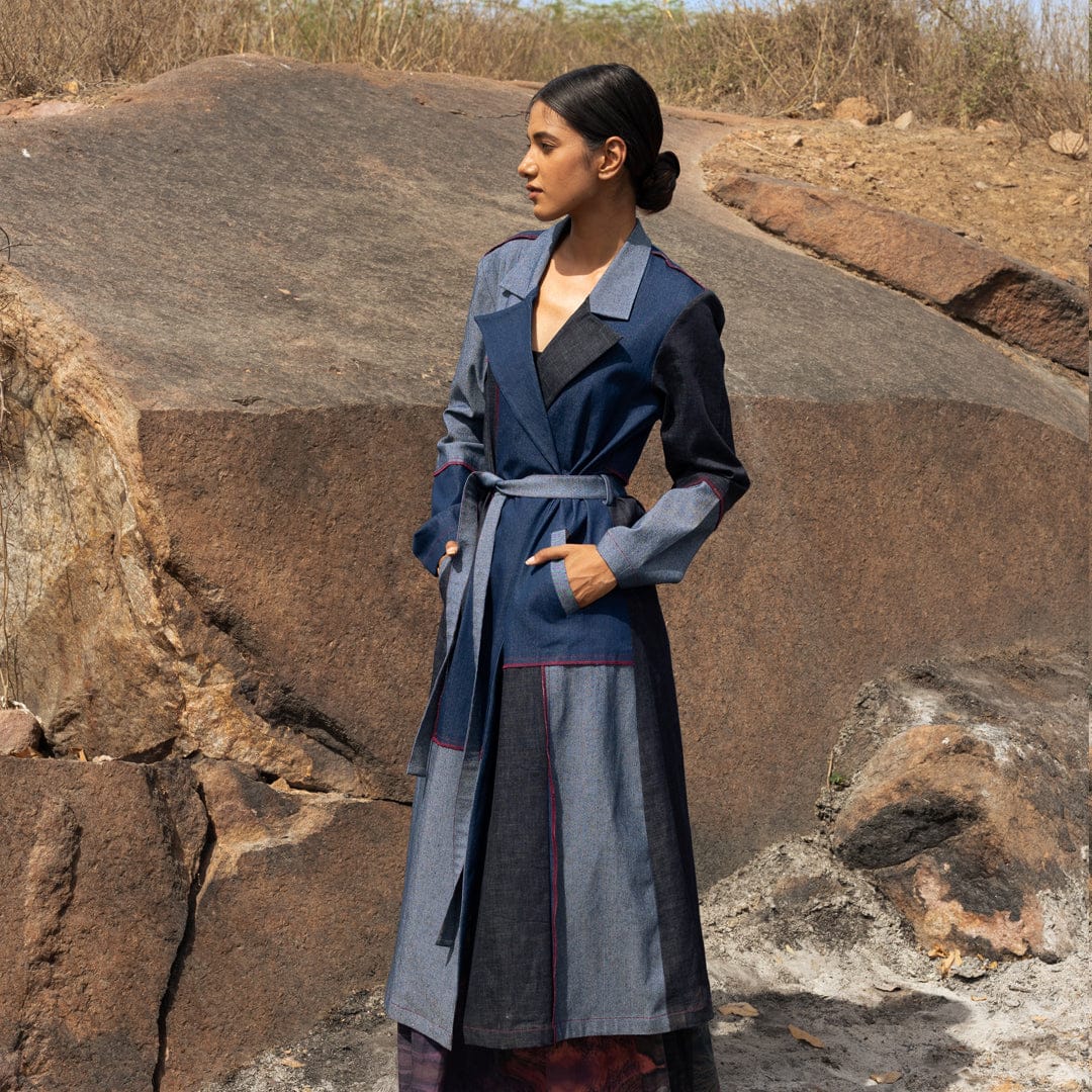 Doodlage Amelia denim trench outerwear with classic collar, button closure, and belted waist, displayed on a hanger.