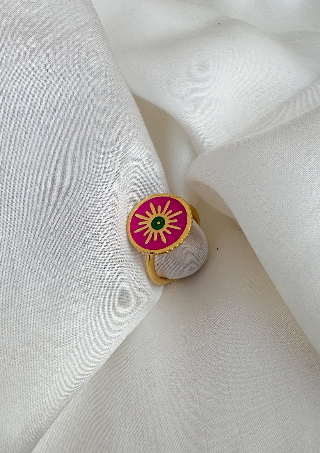 Sun meenakari ring from The Raw India, intricate gold and colorful enamel jewelry with traditional meenakari design.