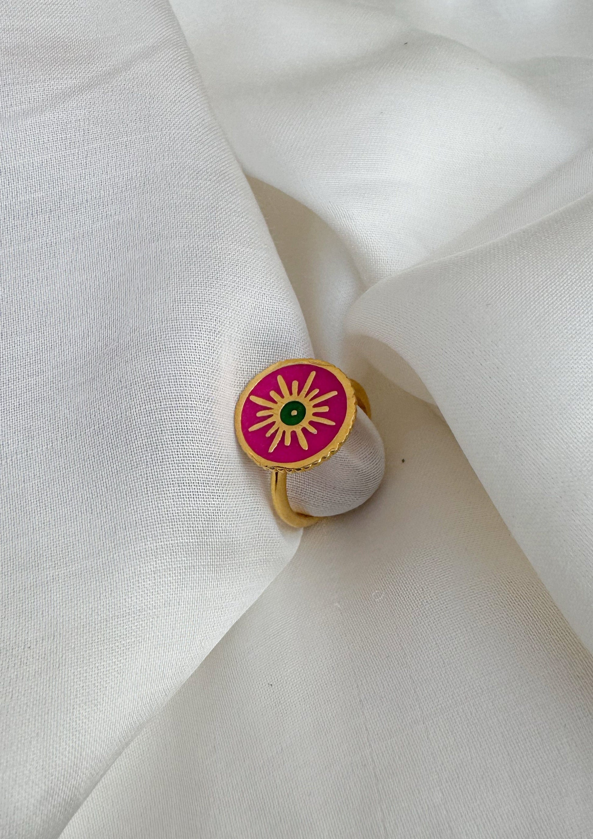 Sun meenakari ring showcasing intricate enamel jewelry design from The Raw India, featuring colorful meenakari craftsmanship.