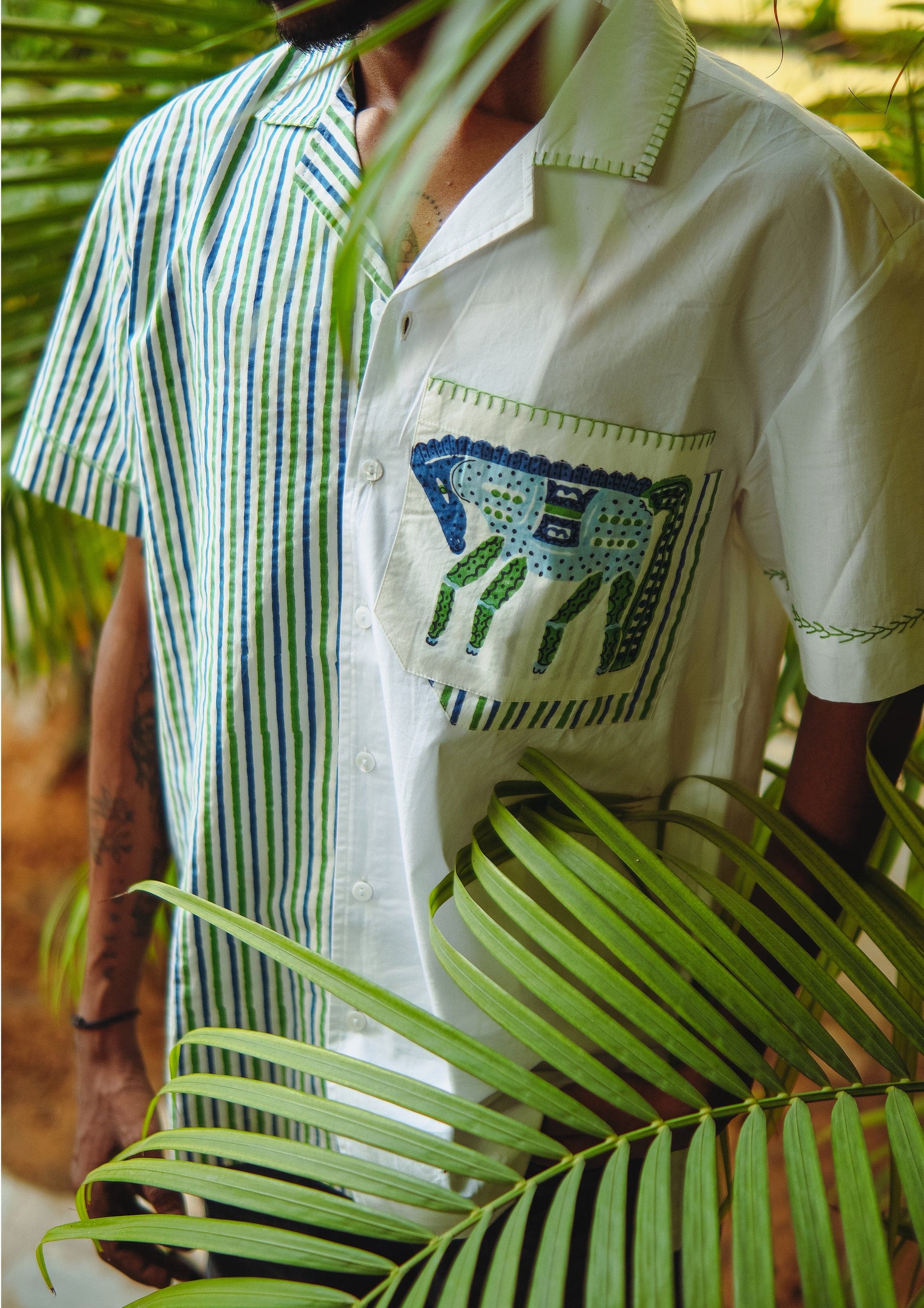 The Raw India Chetak shirt featuring traditional Jodhpur horse design, made from comfortable fabric, displayed on a hanger.