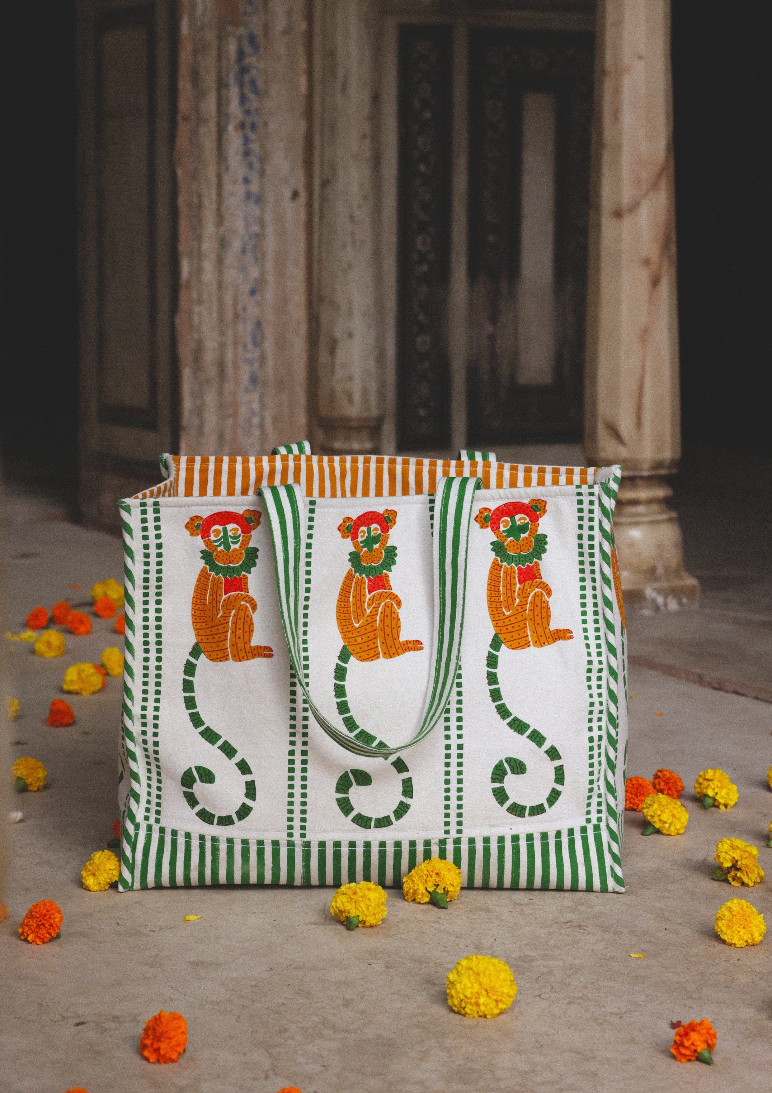 Cotton tote bag with monkey block print by The Raw India, featuring a spacious design and natural fabric appearance.