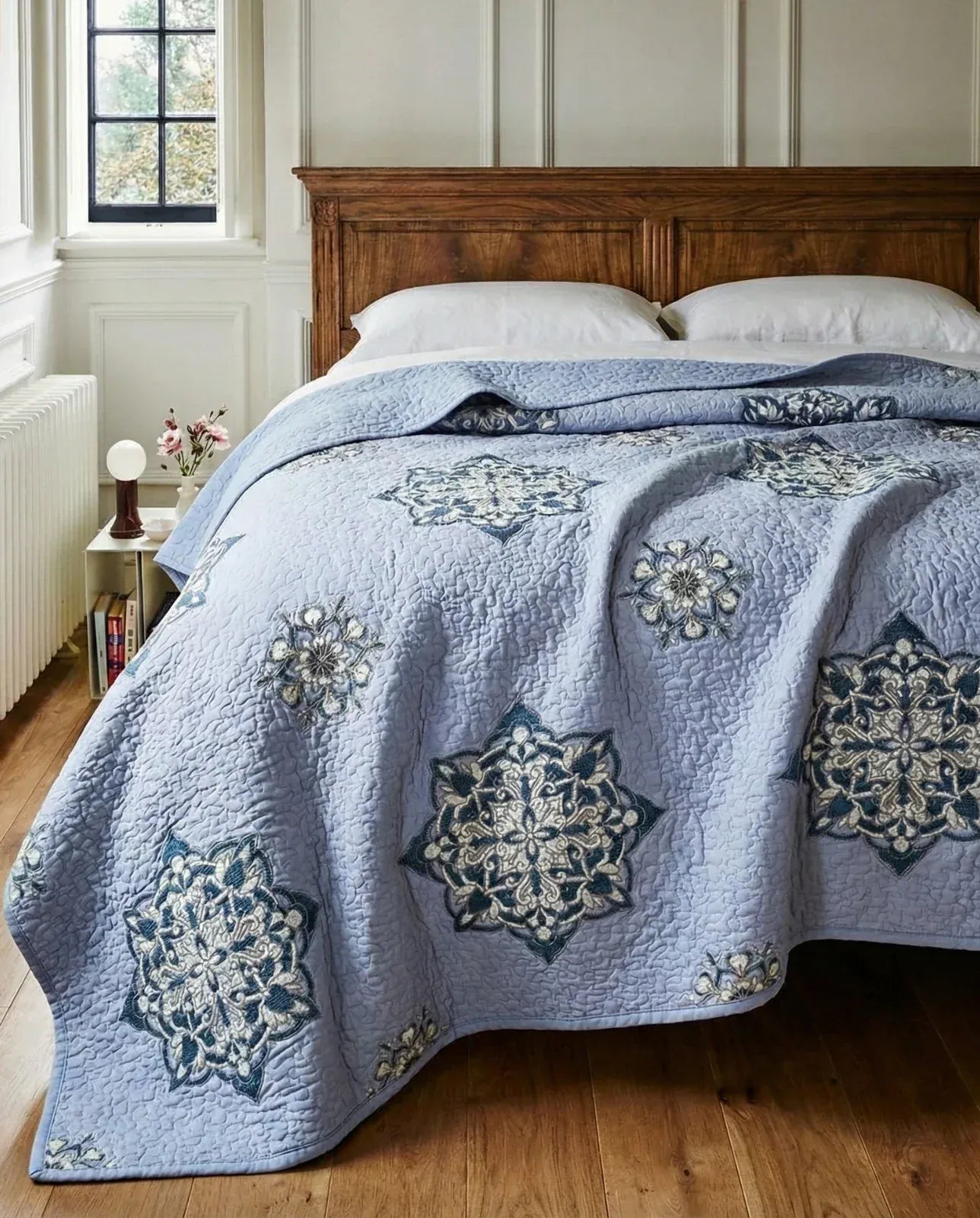 Lilac Suzani quilt from Bombaybirds, a vibrant and intricate living room throw with traditional embroidered patterns.