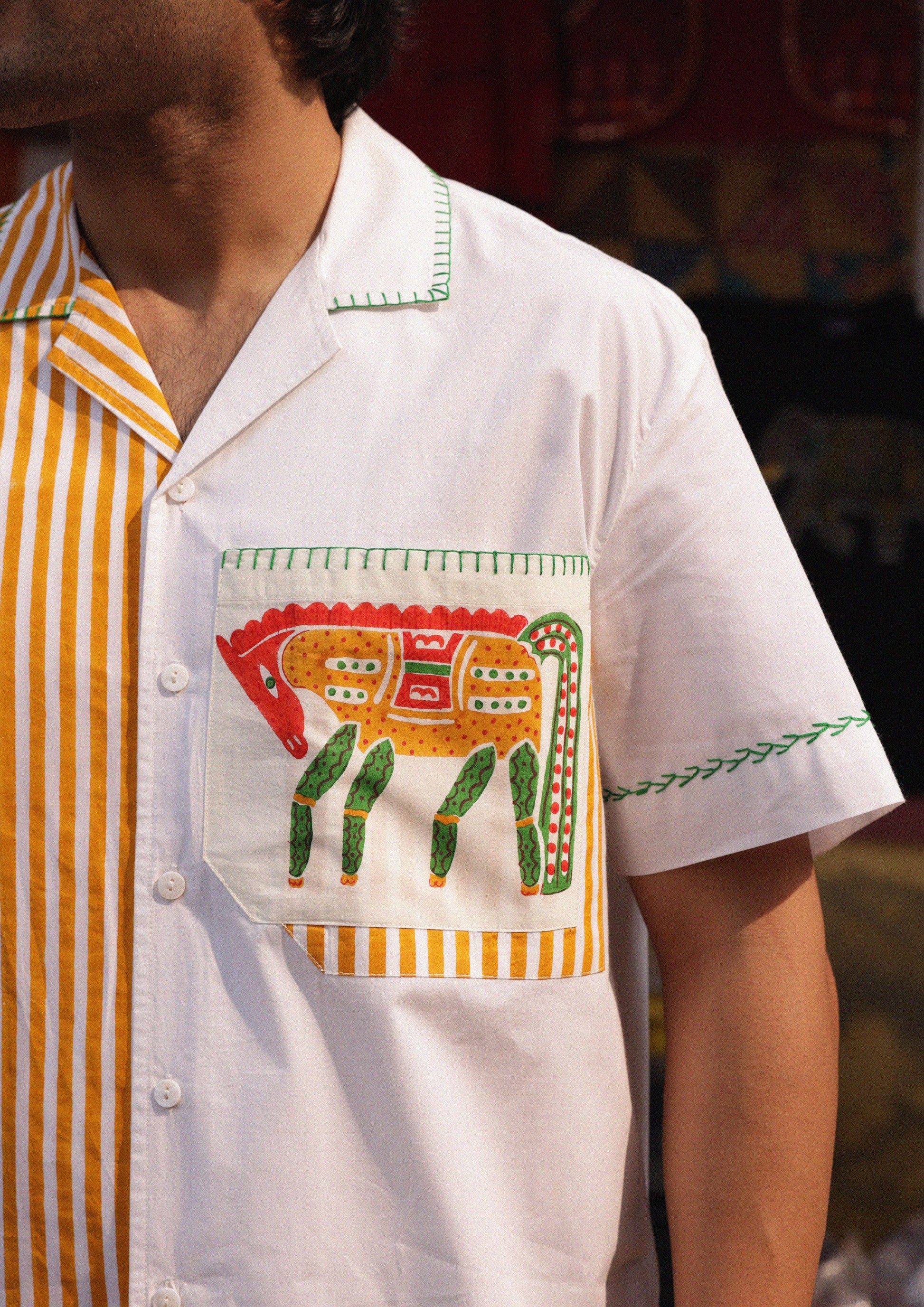 The Raw India Chetak shirt featuring a horse graphic and chest pocket, made of comfortable fabric, casual wear for men.