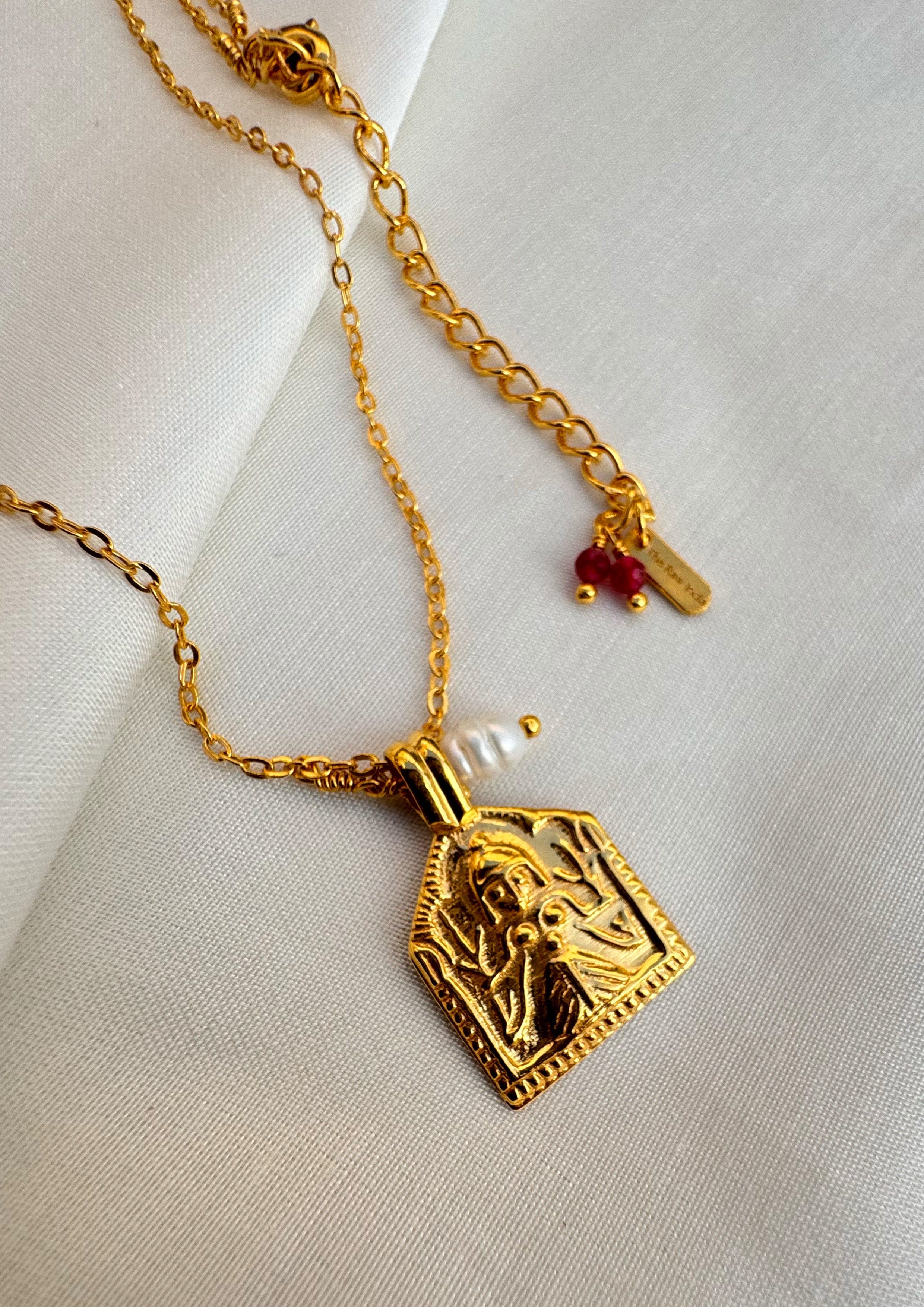 Gold goddess paatri accessory by The Raw India, featuring intricate traditional design and detailed craftsmanship.