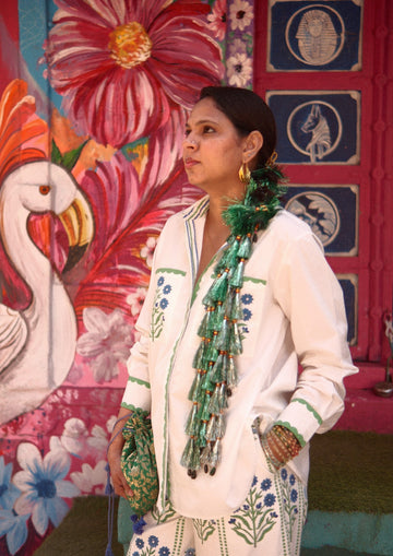 The Raw India Umaid shirt in jodhpur buta print, featuring traditional patterned fabric with a classic collar and button closure.