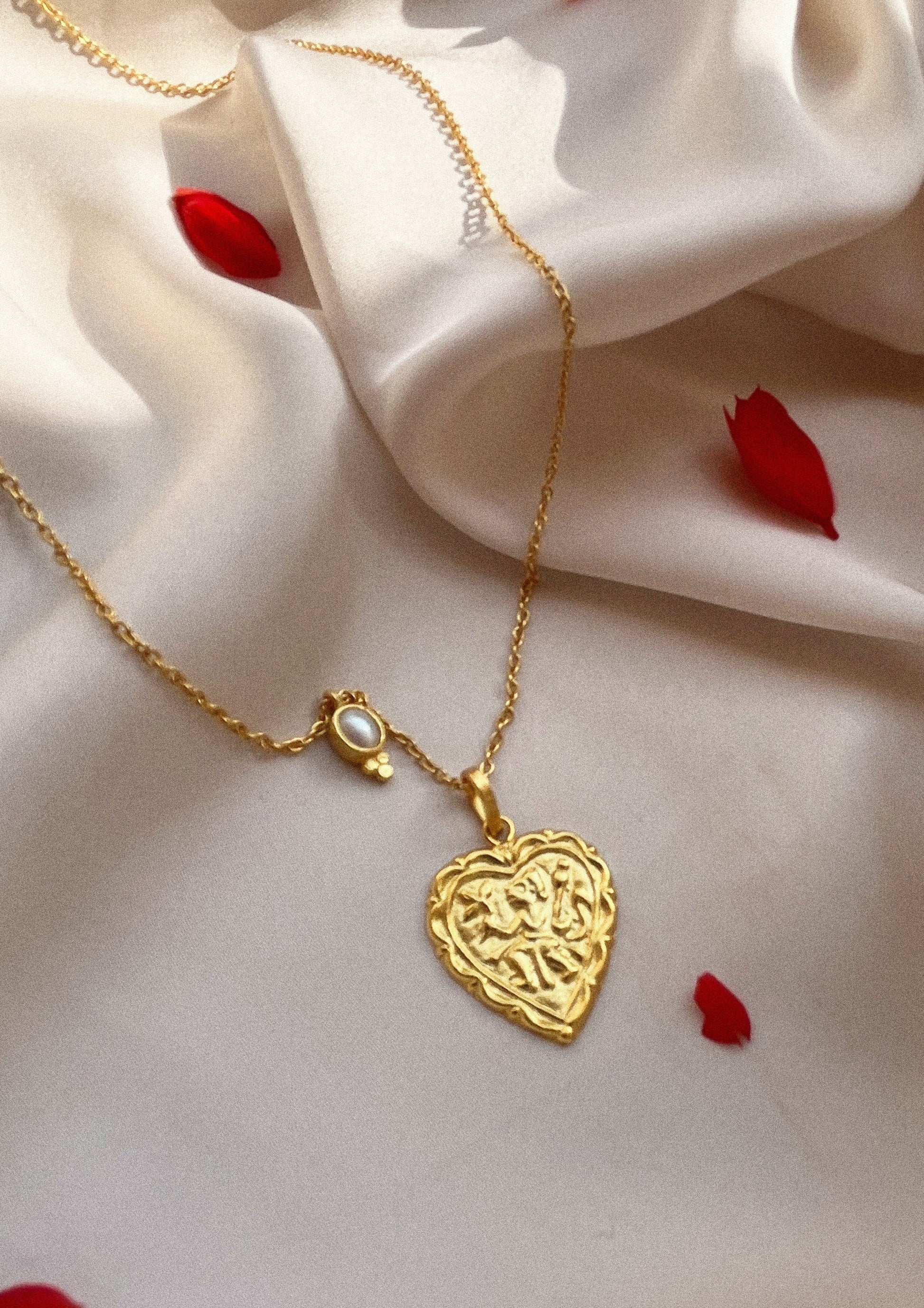 Heart-shaped accessory from The Raw India, stylish jewelry piece with intricate design, perfect for accessorizing any outfit.