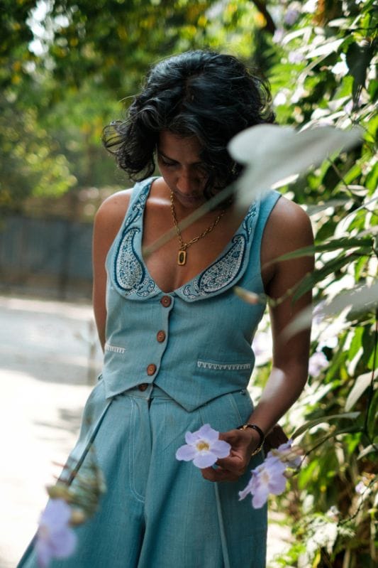 Handloom denim Koti waistcoat by JODI, featuring traditional craftsmanship and stylish design, shown in a close-up image.