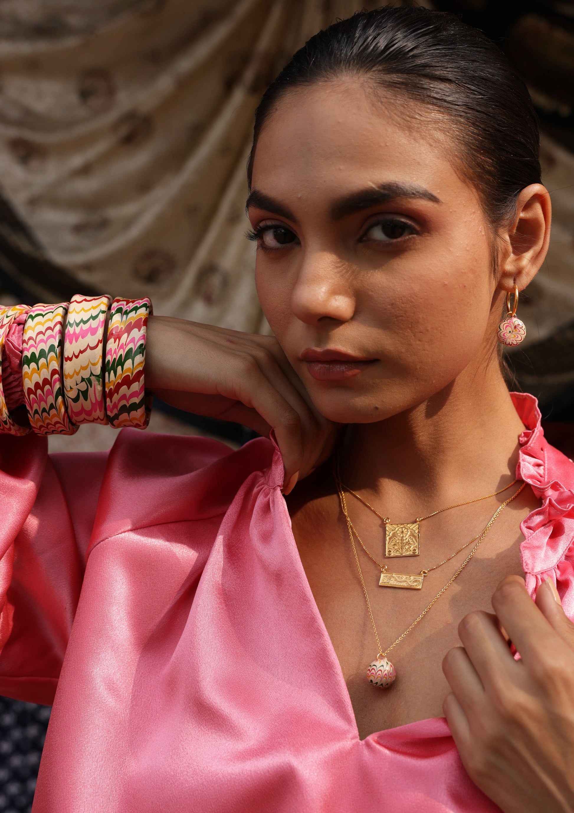 Lac pendant jewelry by The Raw India featuring a handcrafted natural lac design with intricate detailing.