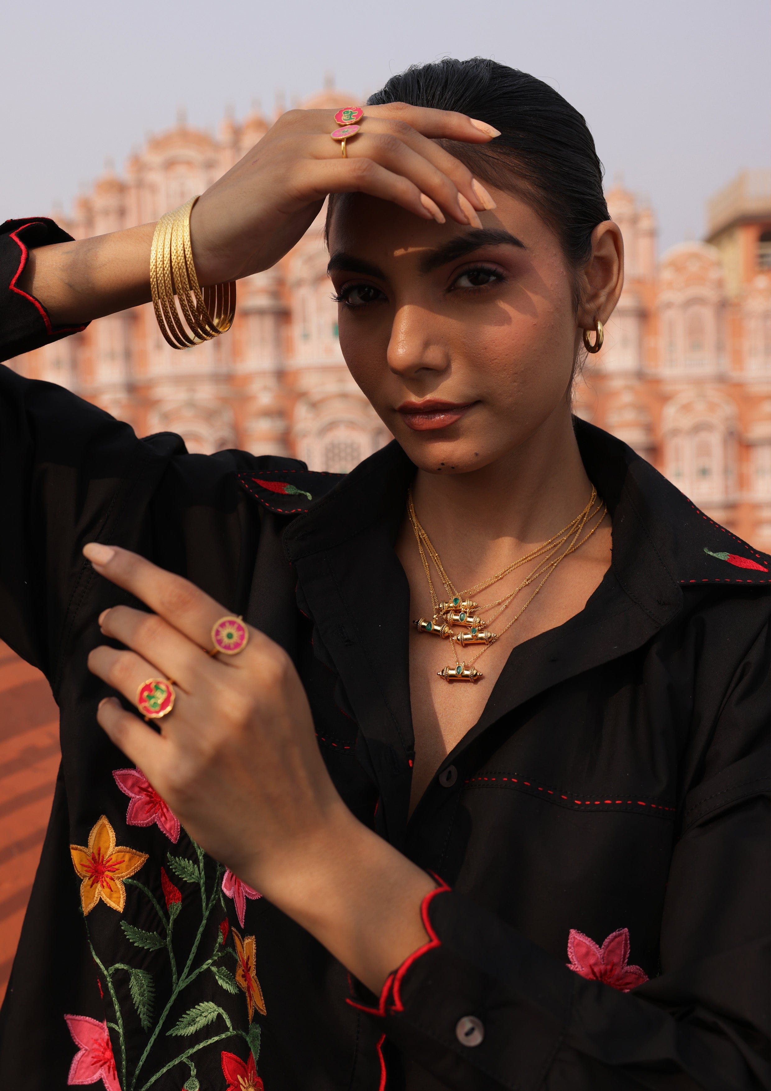 Maadliya clothing by The Raw India featuring traditional fabric and intricate embroidery in vibrant colors.
