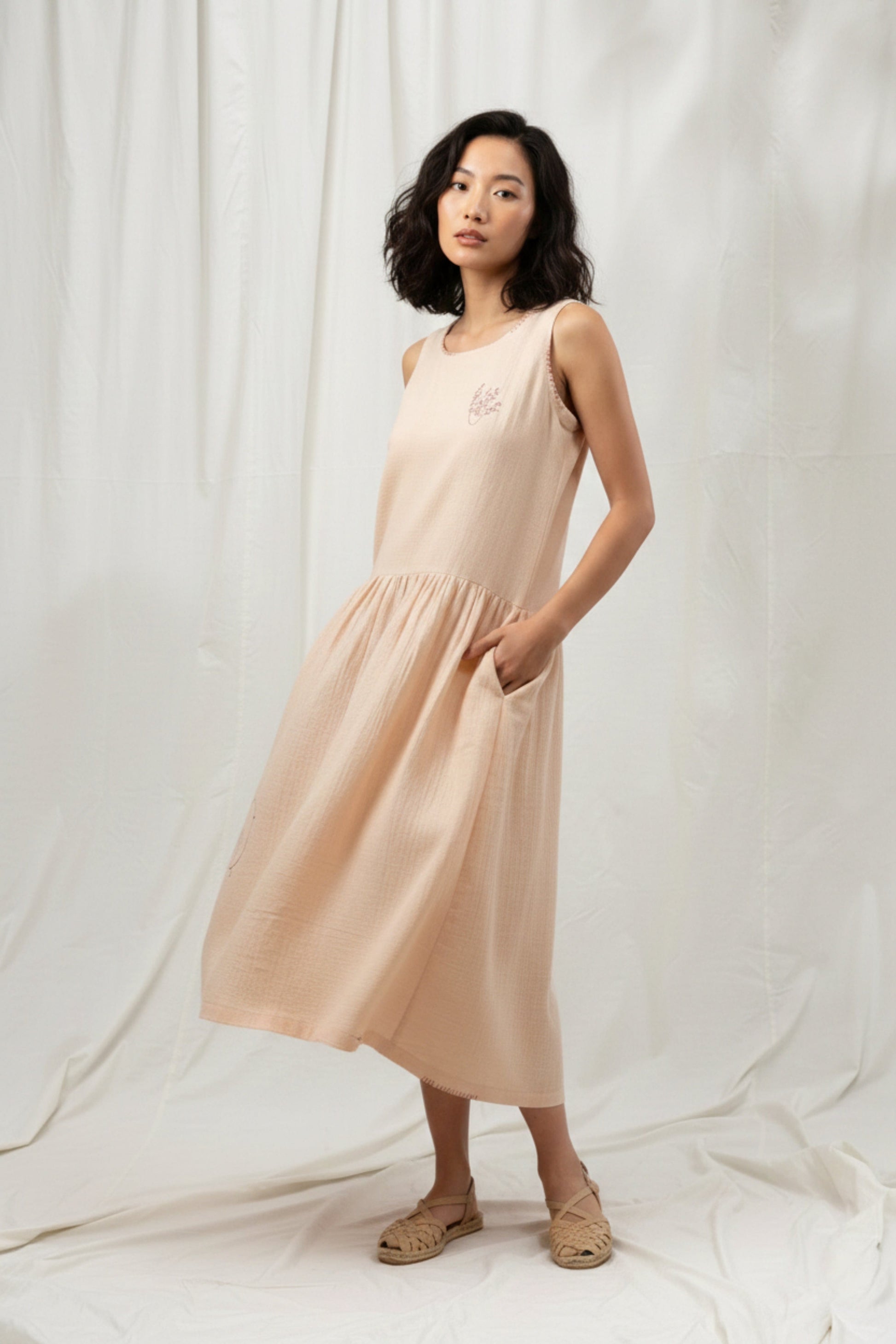 Doodlage Susan drop waist dress featuring a relaxed fit, drop waist design, and floral print on lightweight fabric.