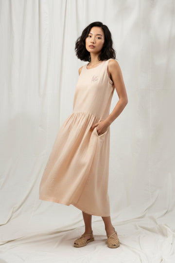Doodlage Susan drop waist dress featuring a relaxed fit, drop waist design, and floral print on lightweight fabric.