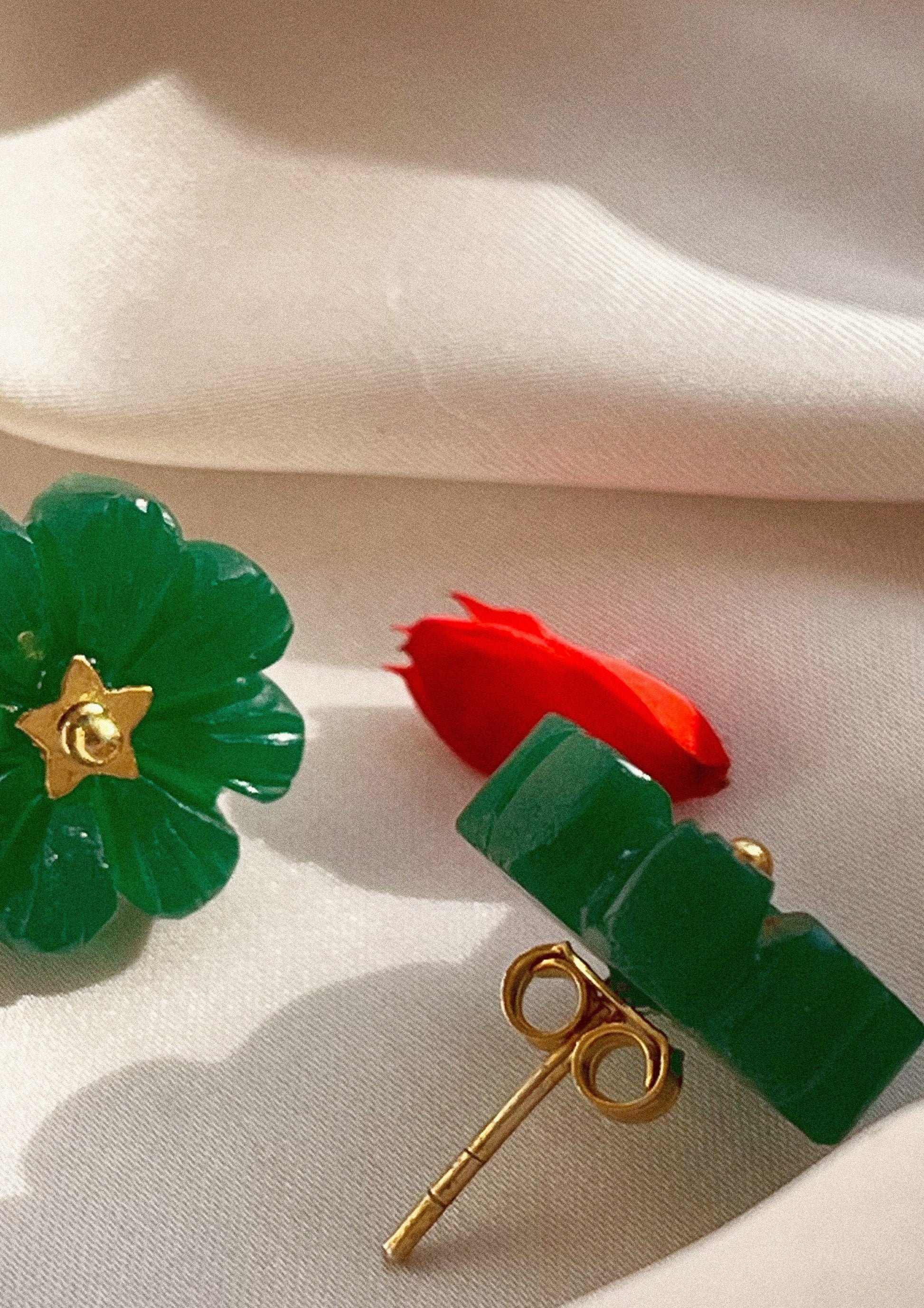 Green onyx flower stud earrings from The Raw India, showcasing elegant jewelry with floral design and vibrant gemstone details.