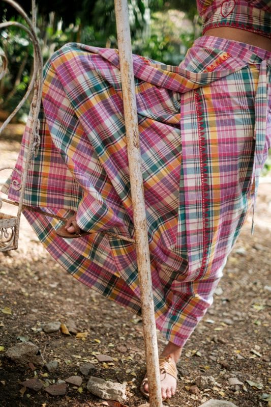 JODI Chokadi lungi skirt with traditional patterns, flowy fabric, and vibrant colors, displayed on a neutral background.