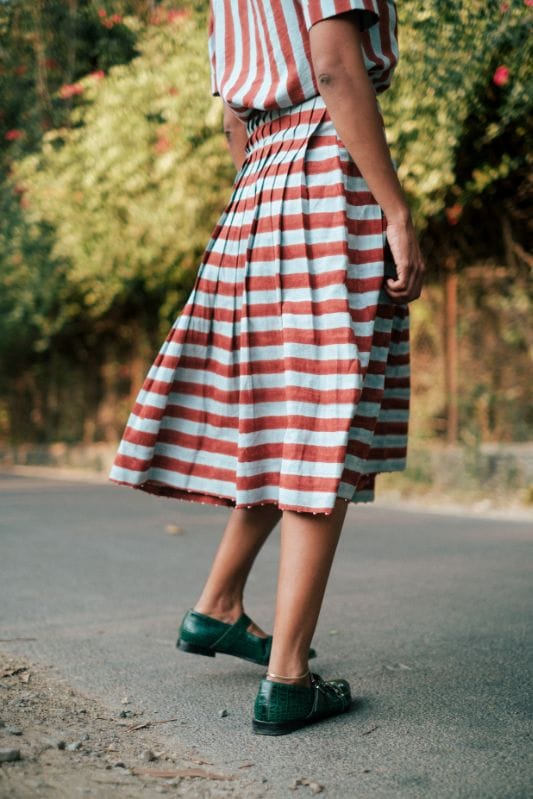 JODI Doriya pleated skirt in soft fabric, featuring elegant pleats and a flowy design, perfect for stylish everyday wear.