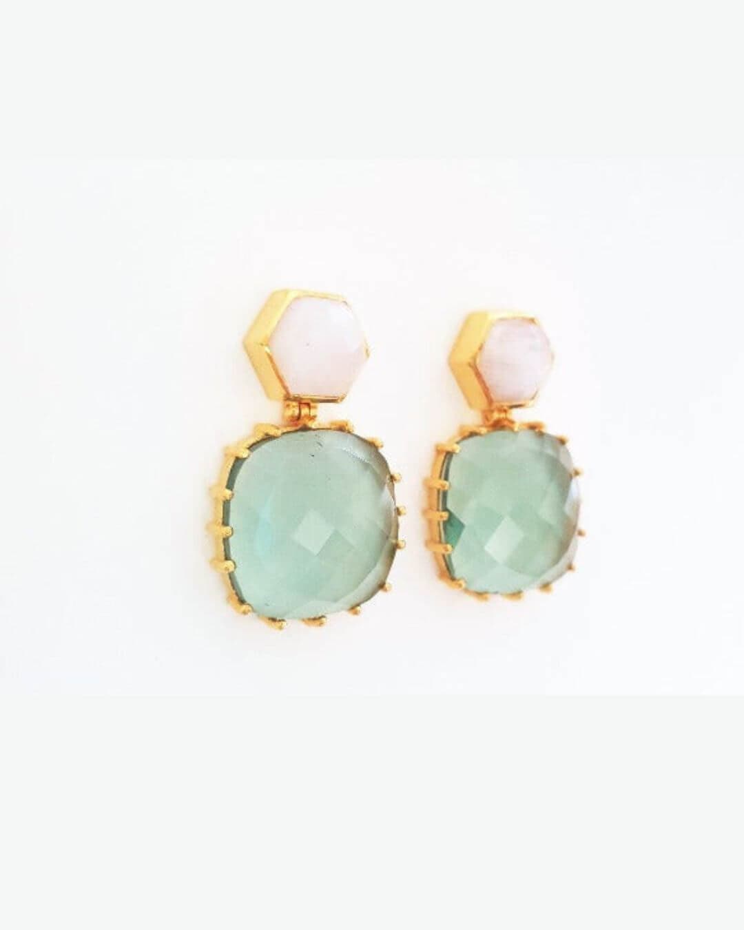 Gold earrings with intricate design from Bombaybirds' Ila collection, featuring elegant craftsmanship and a polished finish.
