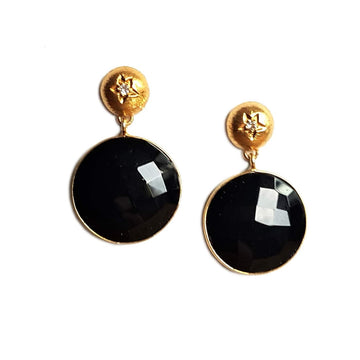 Black Akit earrings by Bombaybirds featuring sleek, minimalist design with intricate details and a polished finish.