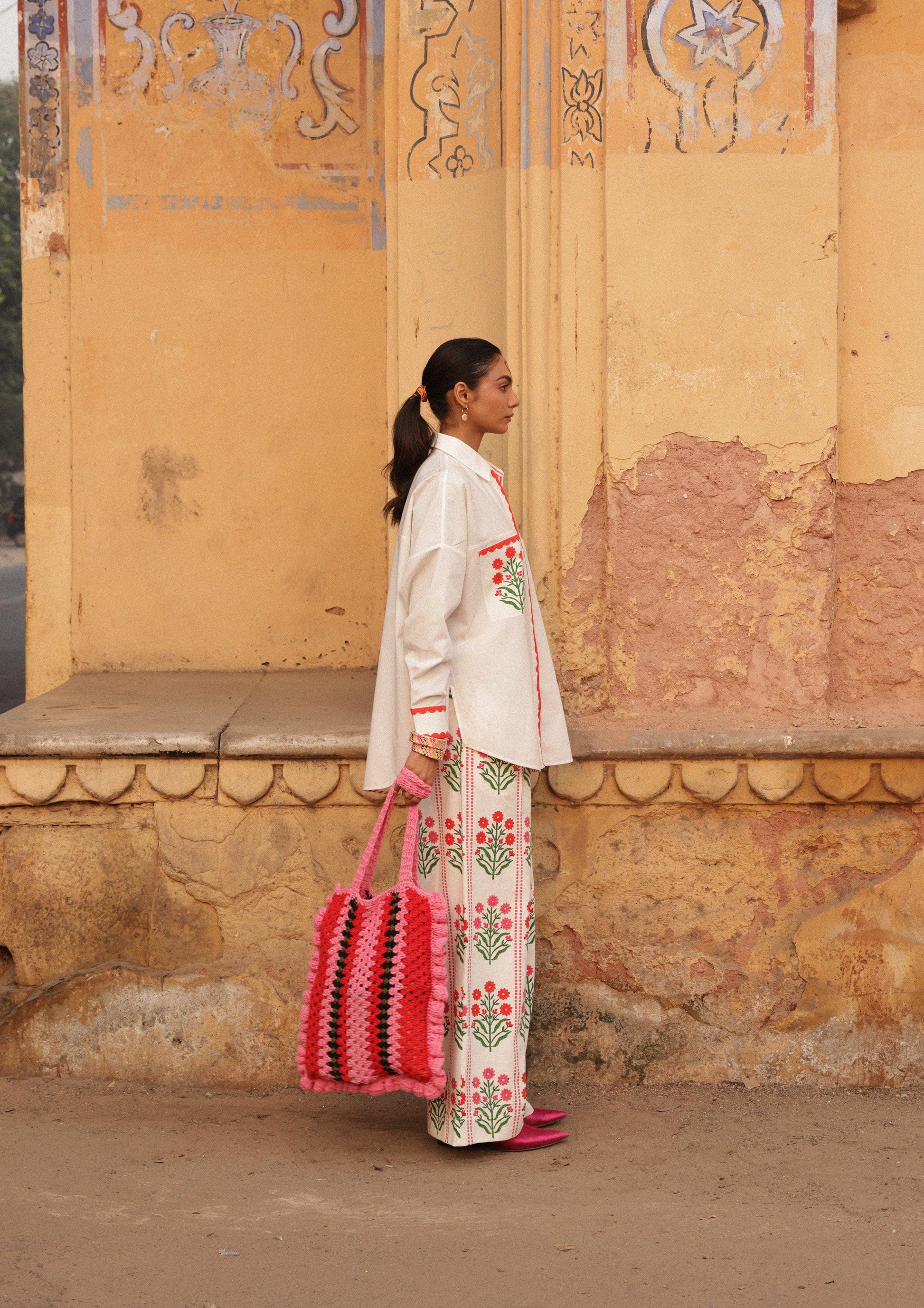 The Raw India Amer pants in Blossom Buta Stripe featuring colorful striped pattern and tailored fit in bottoms category.