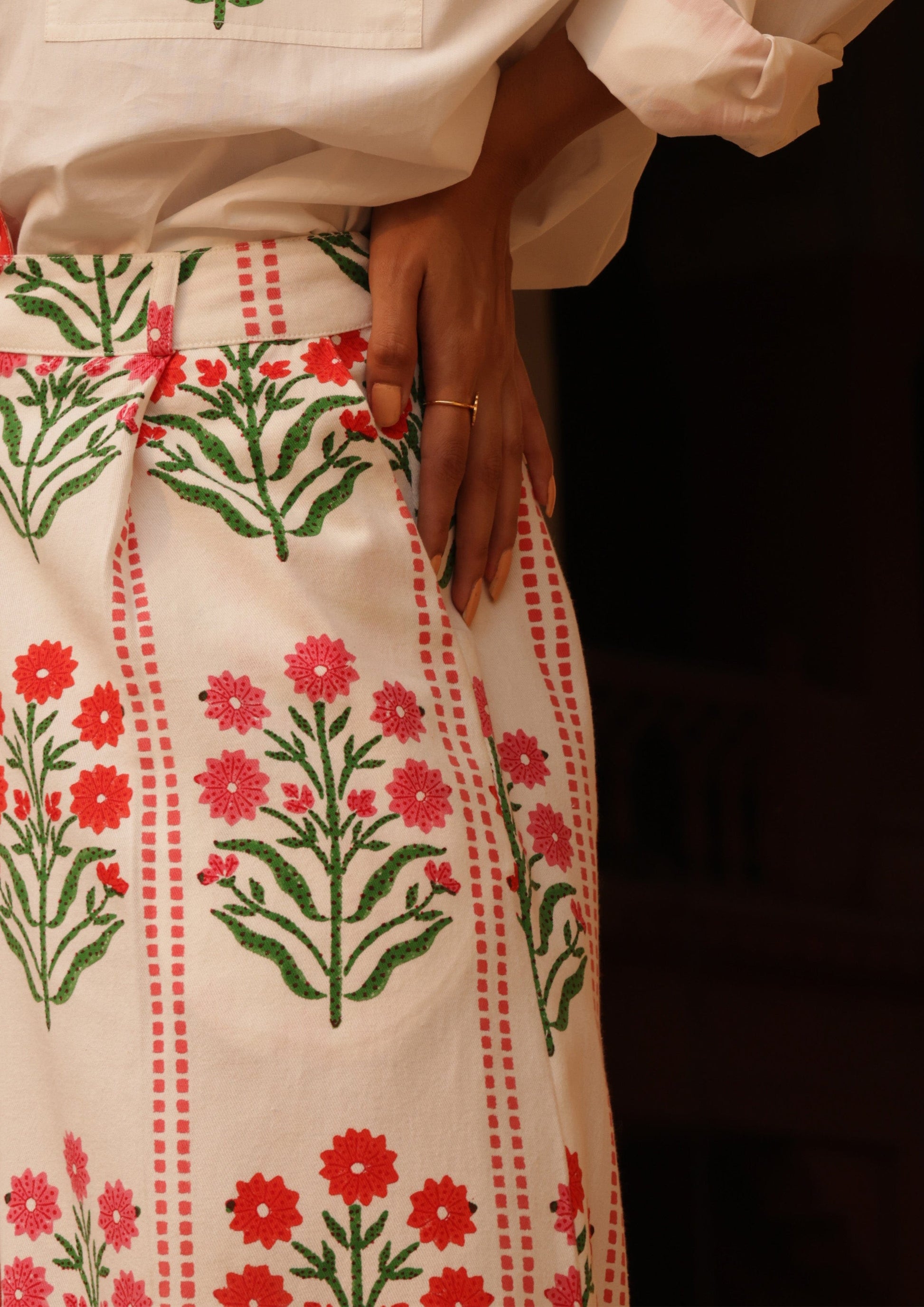 The Raw India Amer pants blossom buta stripe in bottoms, featuring vibrant striped fabric and traditional design details.