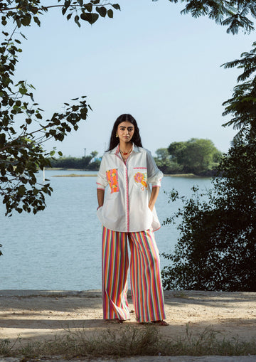 Multi-color striped Amer pants by The Raw India, casual bottoms featuring vibrant horizontal stripe patterns.
