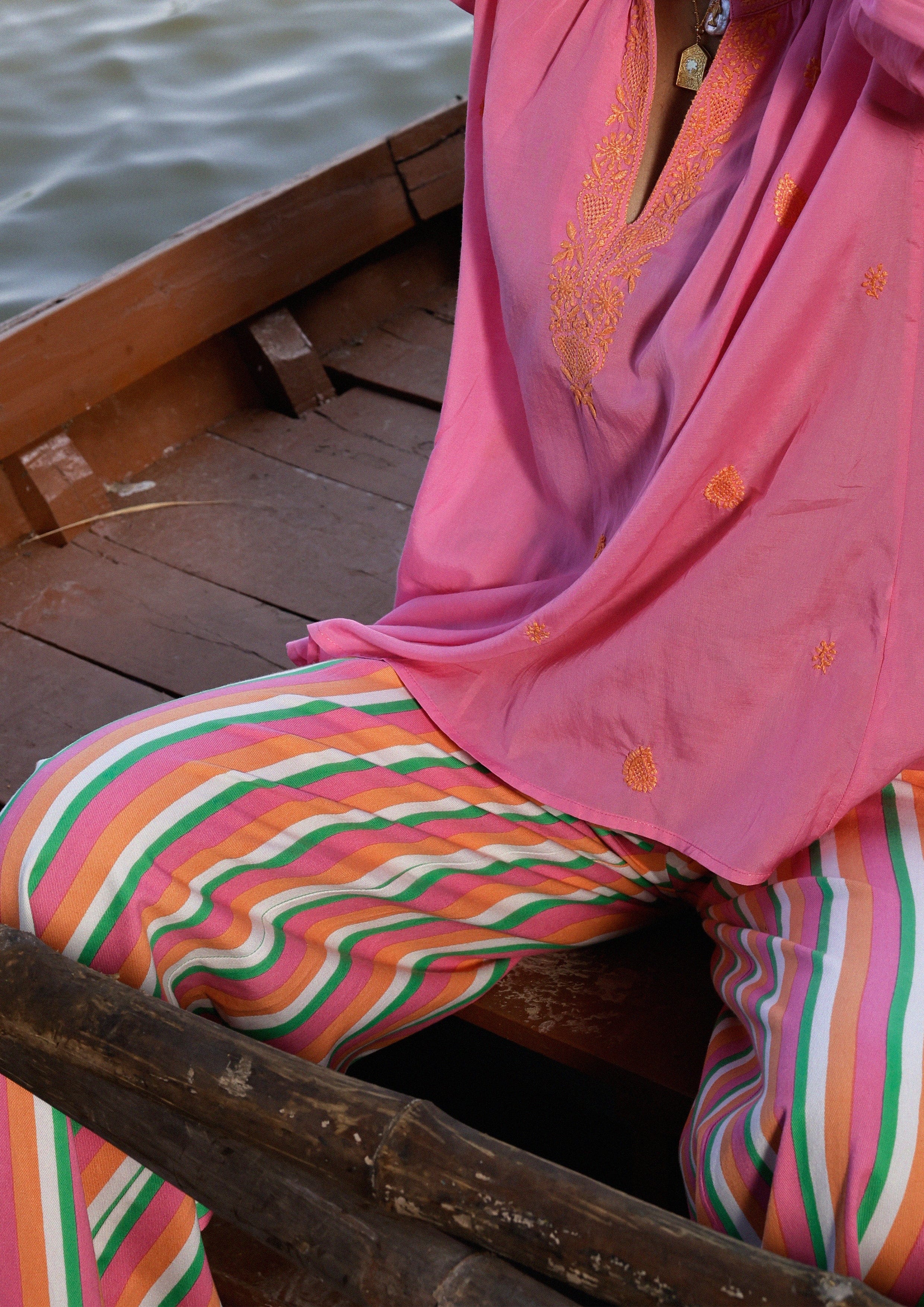 Multi-color striped Amer Pants by The Raw India, casual bottoms with vibrant horizontal stripe pattern and comfortable fit.