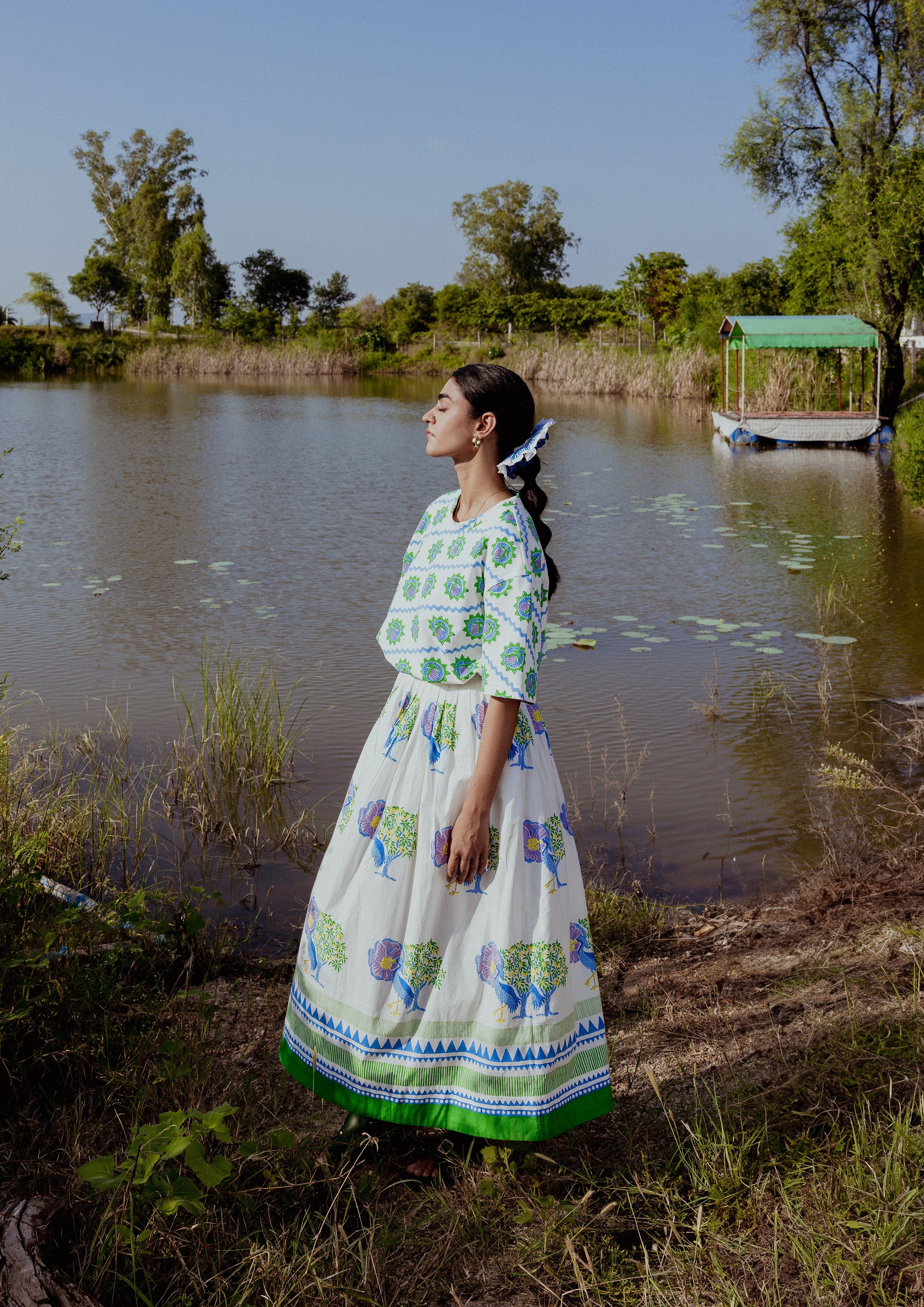 Blue Bawari skirt from The Raw India with Saras Crane pattern, featuring traditional embroidery and flowing fabric design.