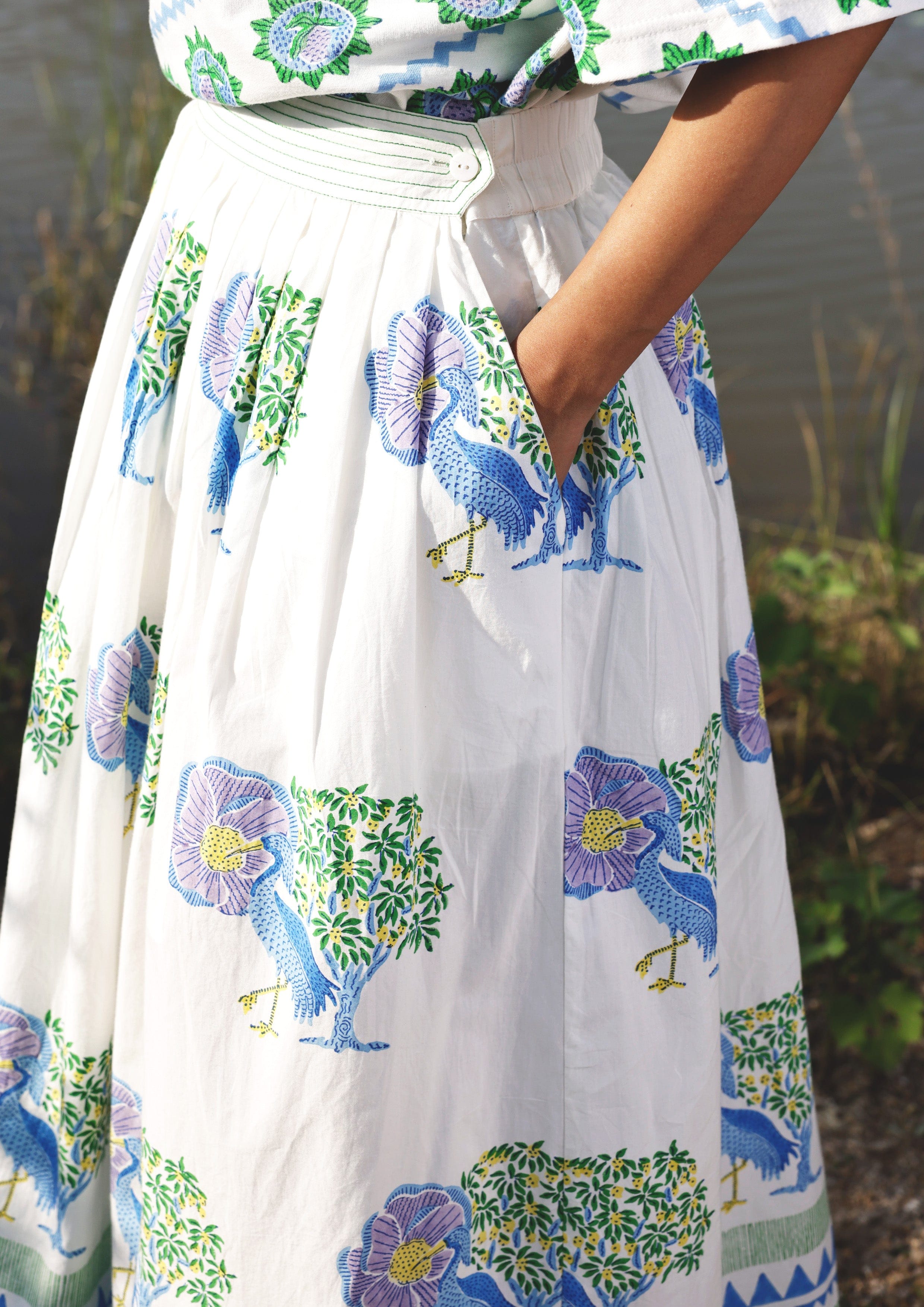 Blue Bawari skirt featuring Saras Crane print from The Raw India, displayed flat showing intricate design and traditional style.