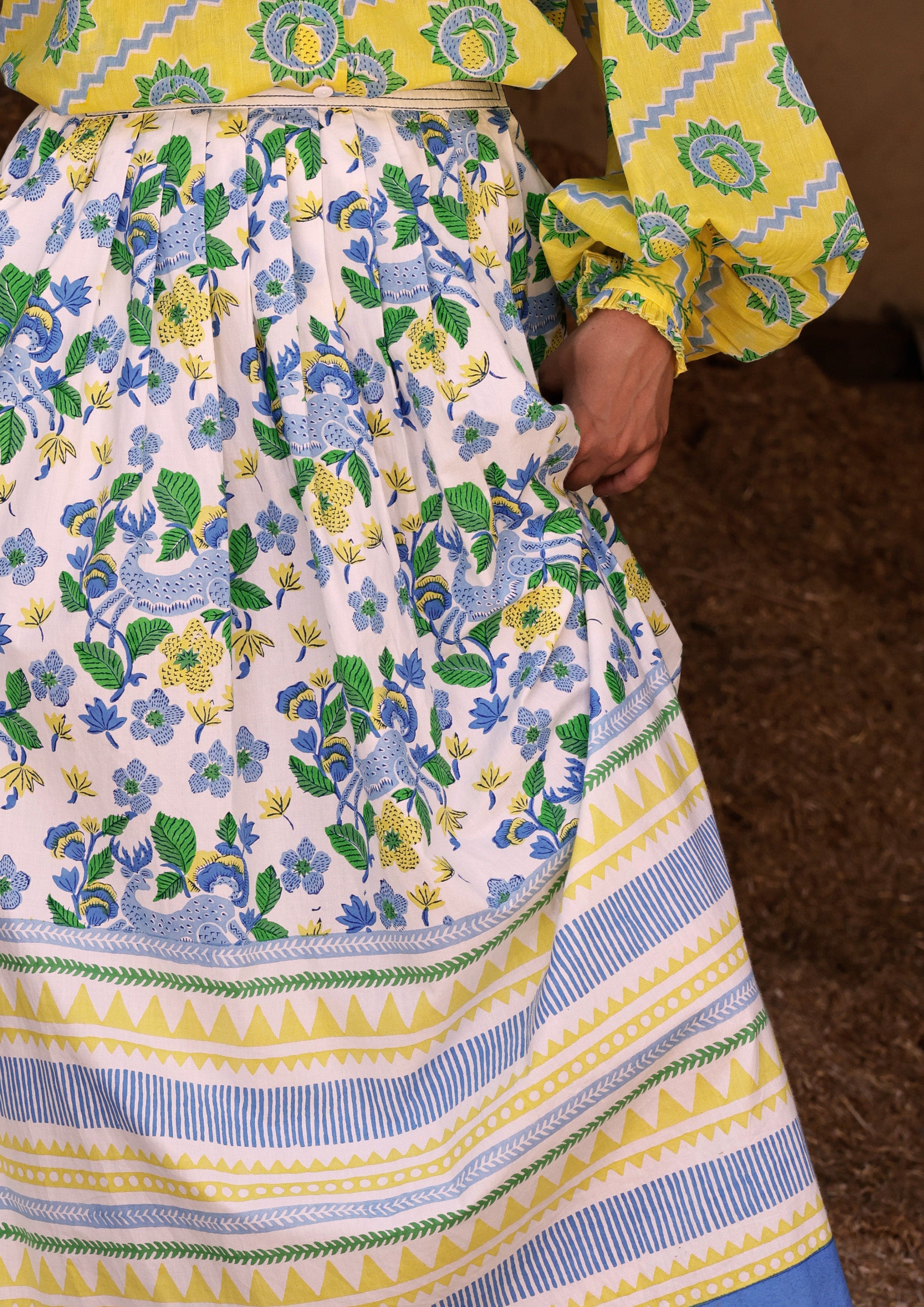 Bawari Skirt by The Raw India featuring swamp deer print, flowing fabric, and traditional Indian-inspired design.