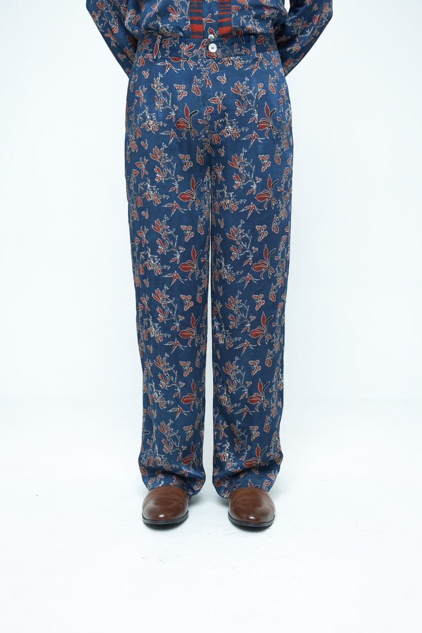 Anushe Pirani garden pleat pants in a relaxed fit, showcasing the front view with pleated detailing and comfortable fabric.