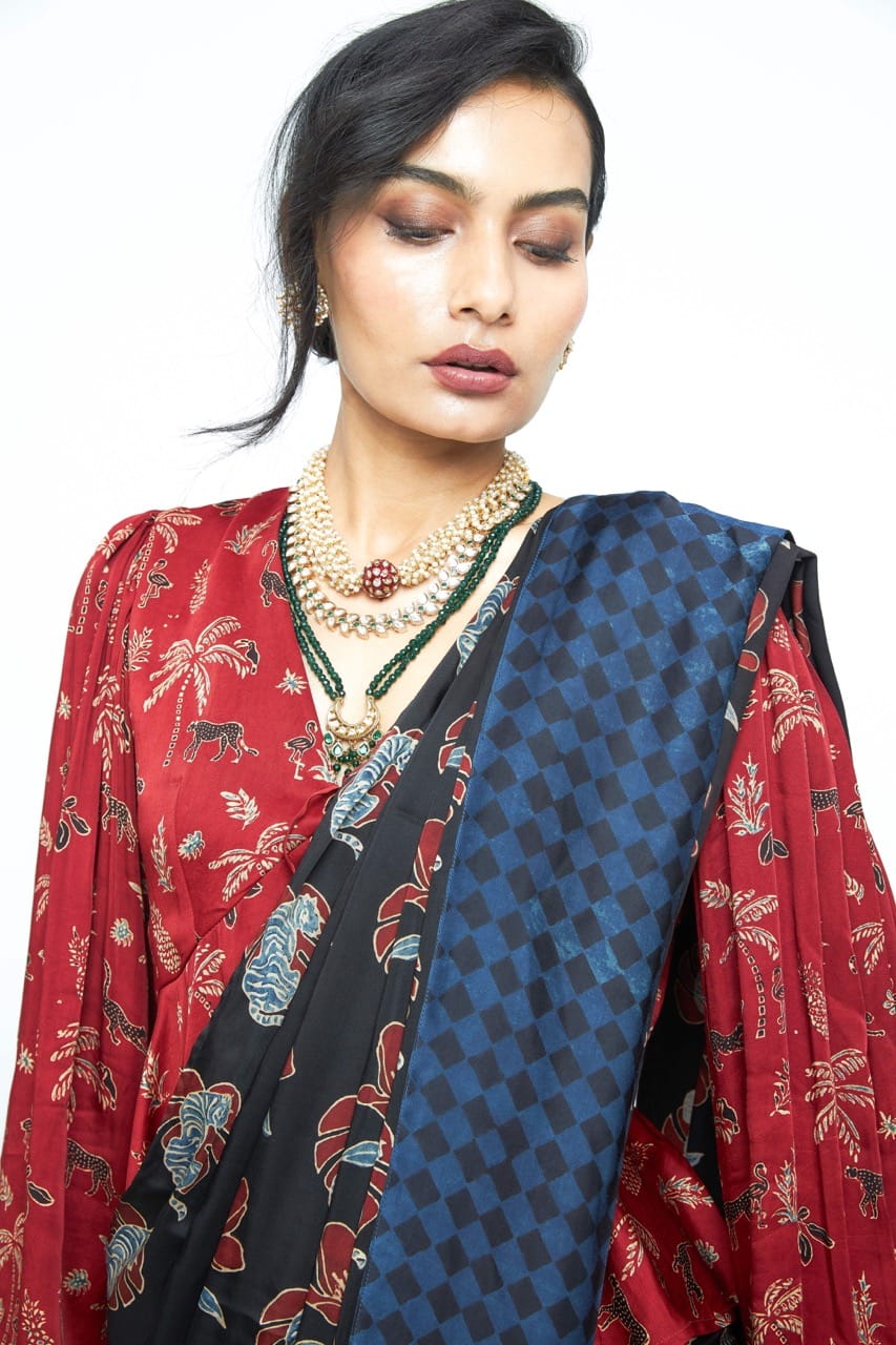 Elegant Wild Bloom saree by Anushe Pirani featuring intricate floral patterns and vibrant colors, draped beautifully.