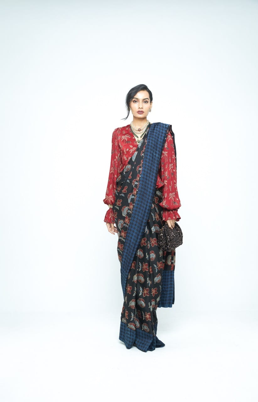 Pre-stitched Wild Bloom saree by Anushe Pirani featuring vibrant floral patterns and elegant draping style.