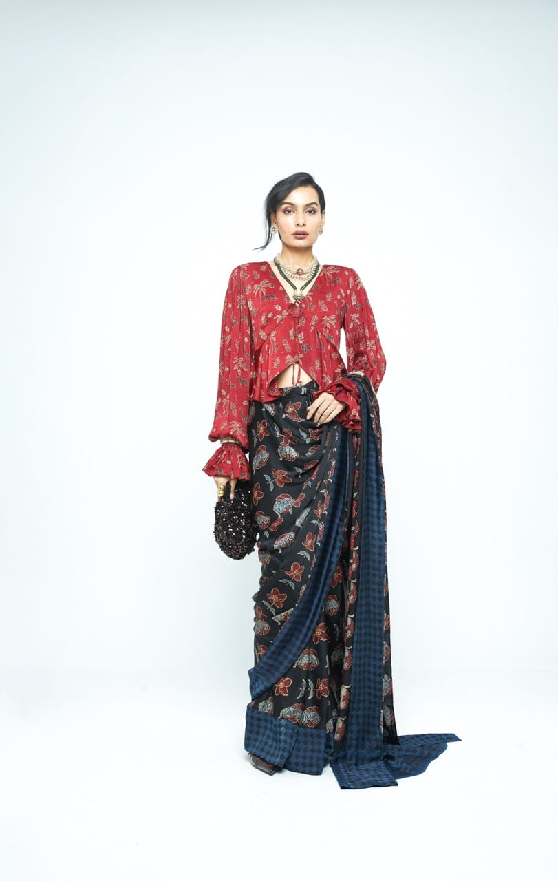 Pre-stitched Wild Bloom saree by Anushe Pirani featuring vibrant floral patterns and elegant draping style.