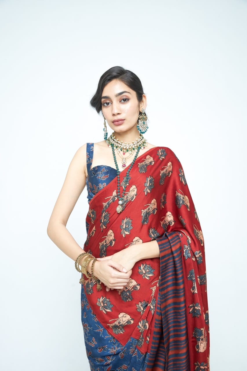 Pre-stitched Eden saree by Anushe Pirani featuring intricate embroidery and elegant drape in vibrant colors.